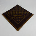 The Louis Vuitton x Supreme headscarf is a rare collaboration accessory featuring luxury silk construction with bold