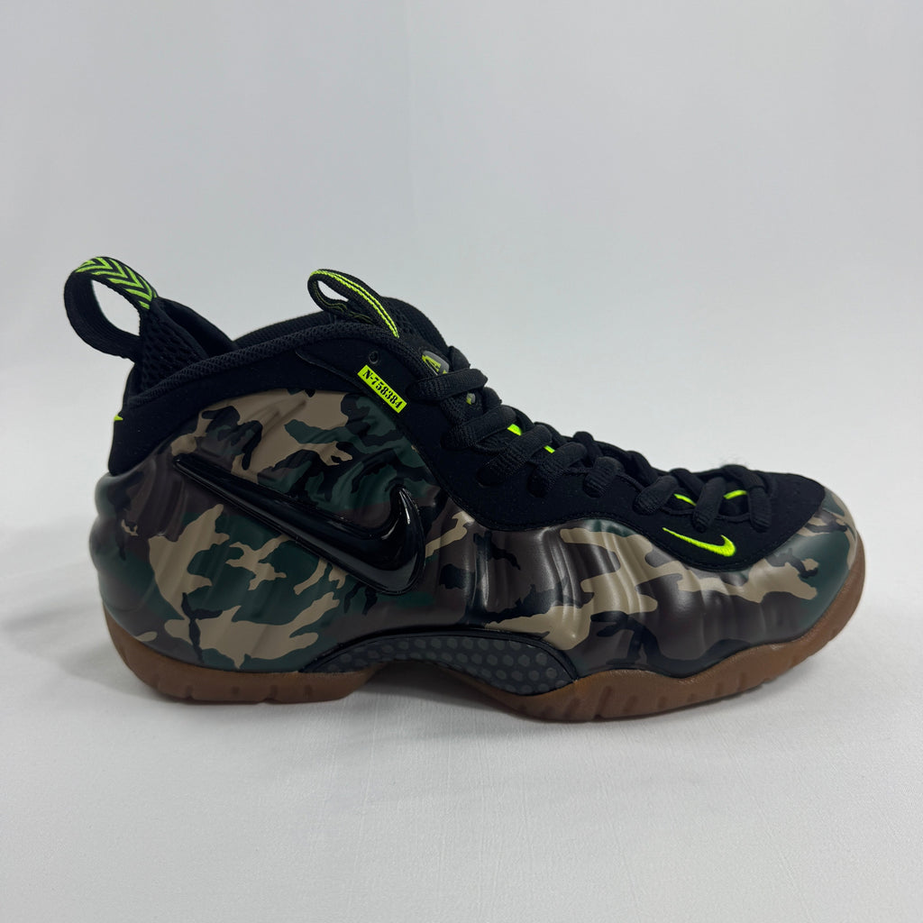 Nike Air Foamposite Pro Army Camo is a bold military-inspired take on the iconic Foamposite Pro silhouette. Featuring a