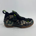 Nike Air Foamposite Pro Army Camo is a bold military-inspired take on the iconic Foamposite Pro silhouette. Featuring a