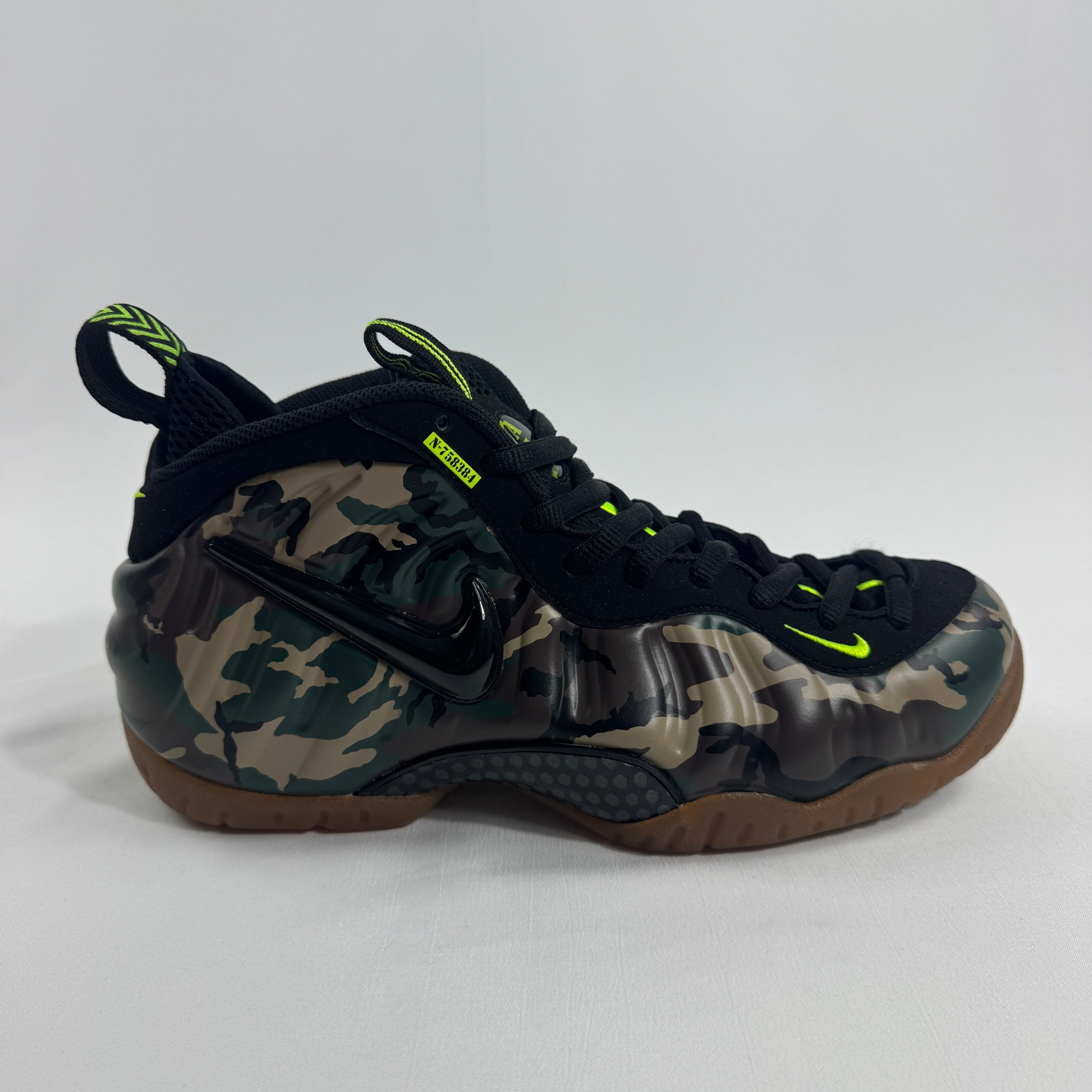 Nike Air Foamposite Pro Army Camo is a bold military-inspired take on the iconic Foamposite Pro silhouette. Featuring a