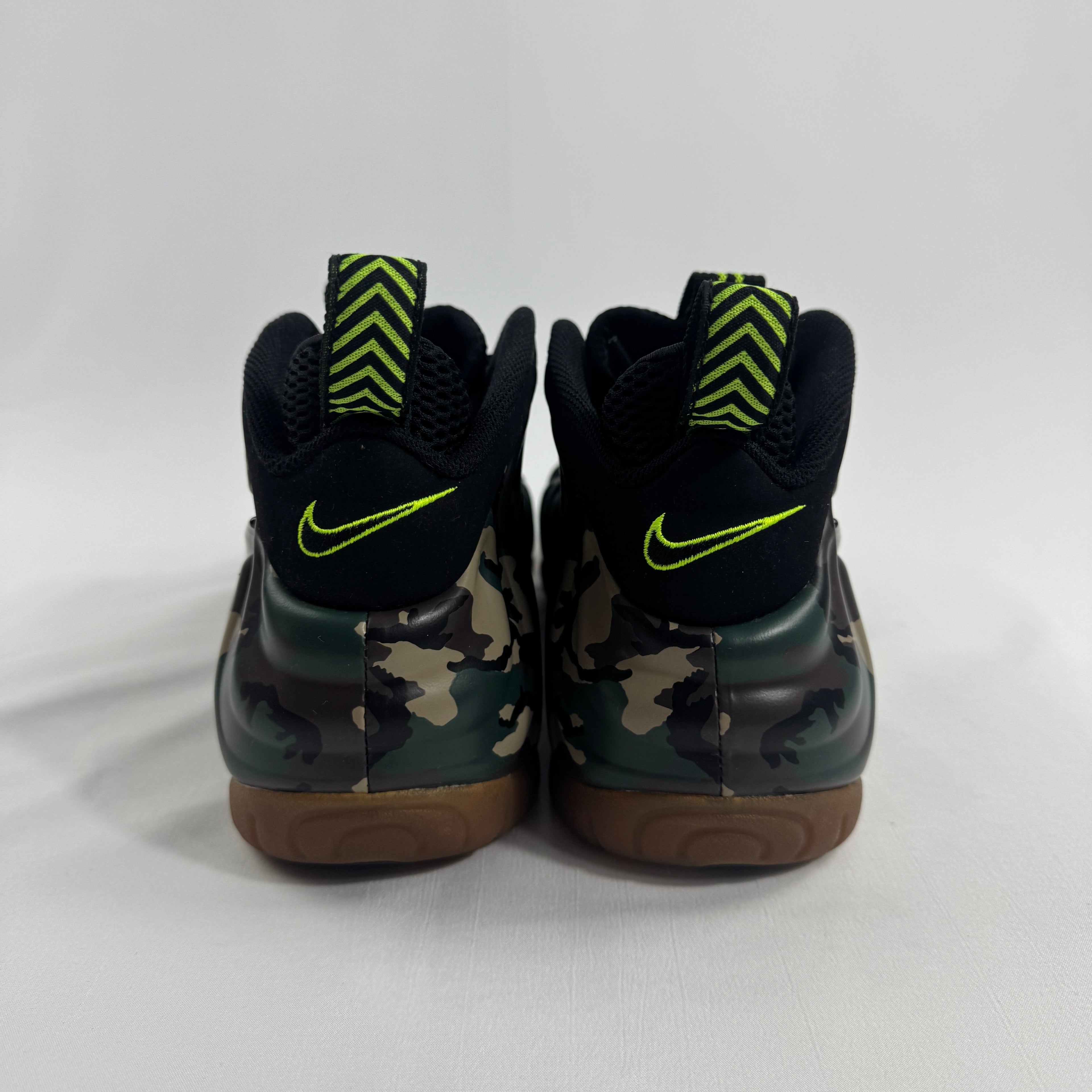 Nike Air Foamposite Pro Army Camo is a bold military-inspired take on the iconic Foamposite Pro silhouette. Featuring a