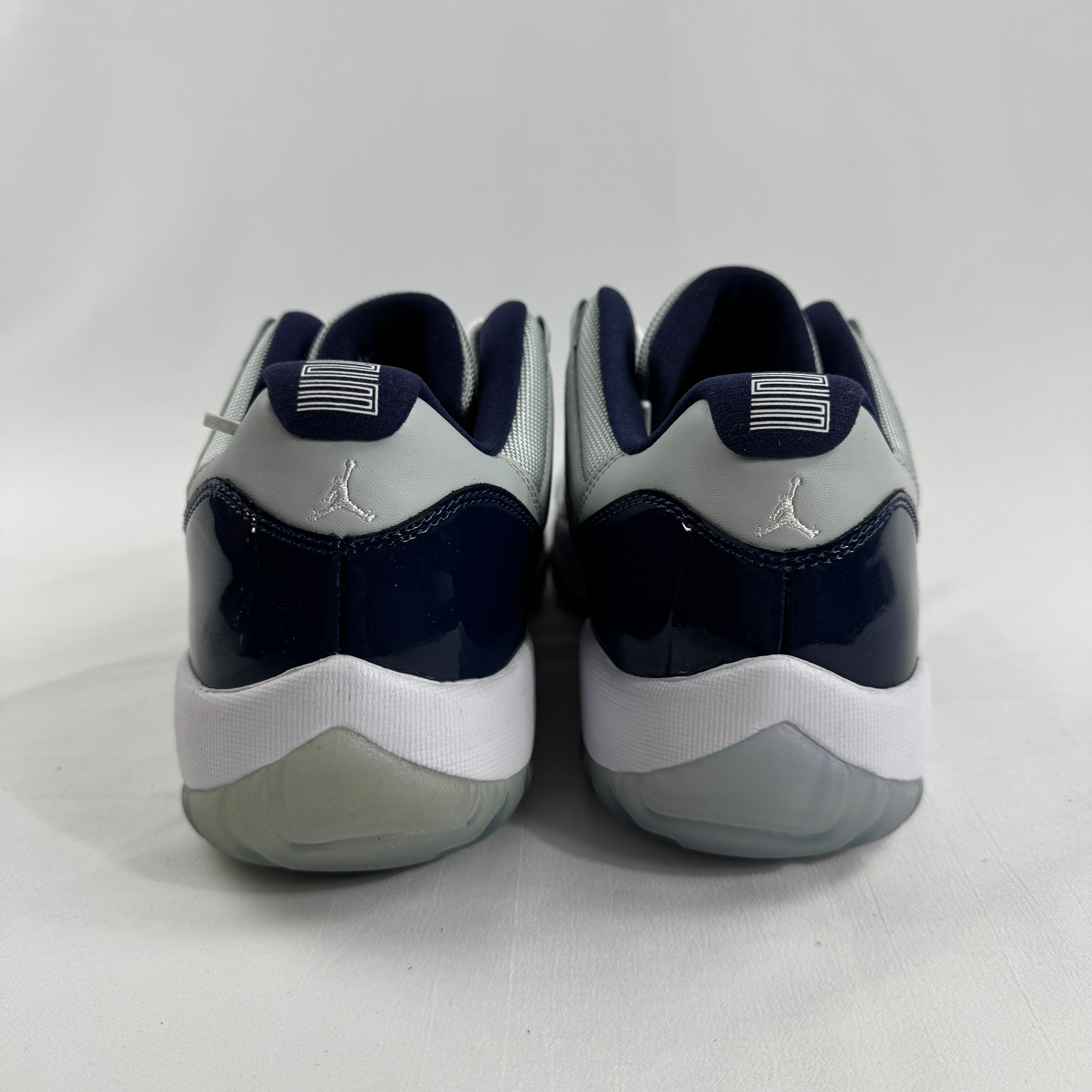 The Air Jordan 11 Low “Midnight Navy” is a low-top Jordan 11 featuring a white upper with navy patent leather and an icy