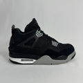The Nike Air Jordan 4 Black Canvas is a versatile sneaker featuring a durable black canvas upper, suede accents, and