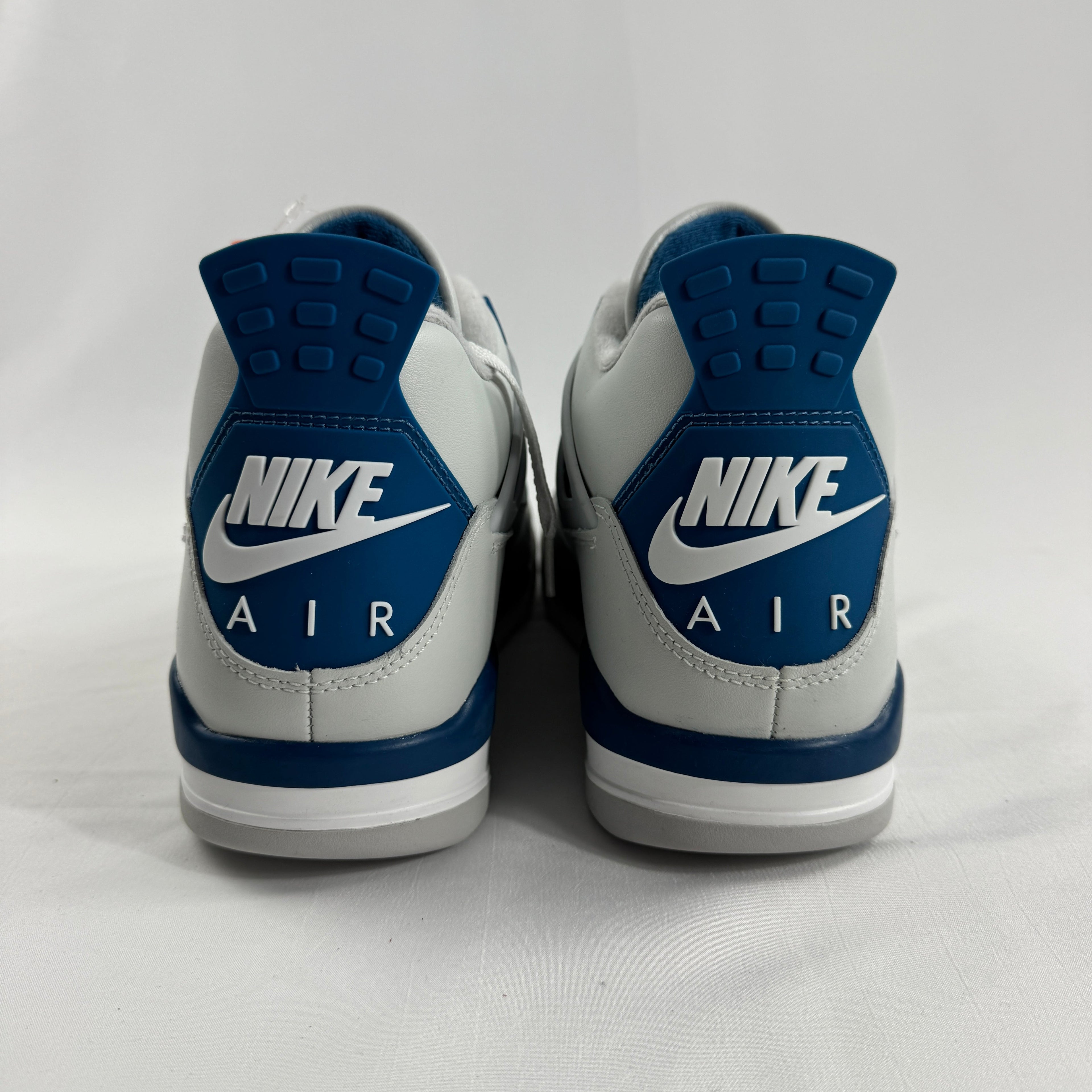 The Air Jordan 4 Retro “Military Blue” is a classic Jordan 4 colourway featuring a white leather upper with grey and black