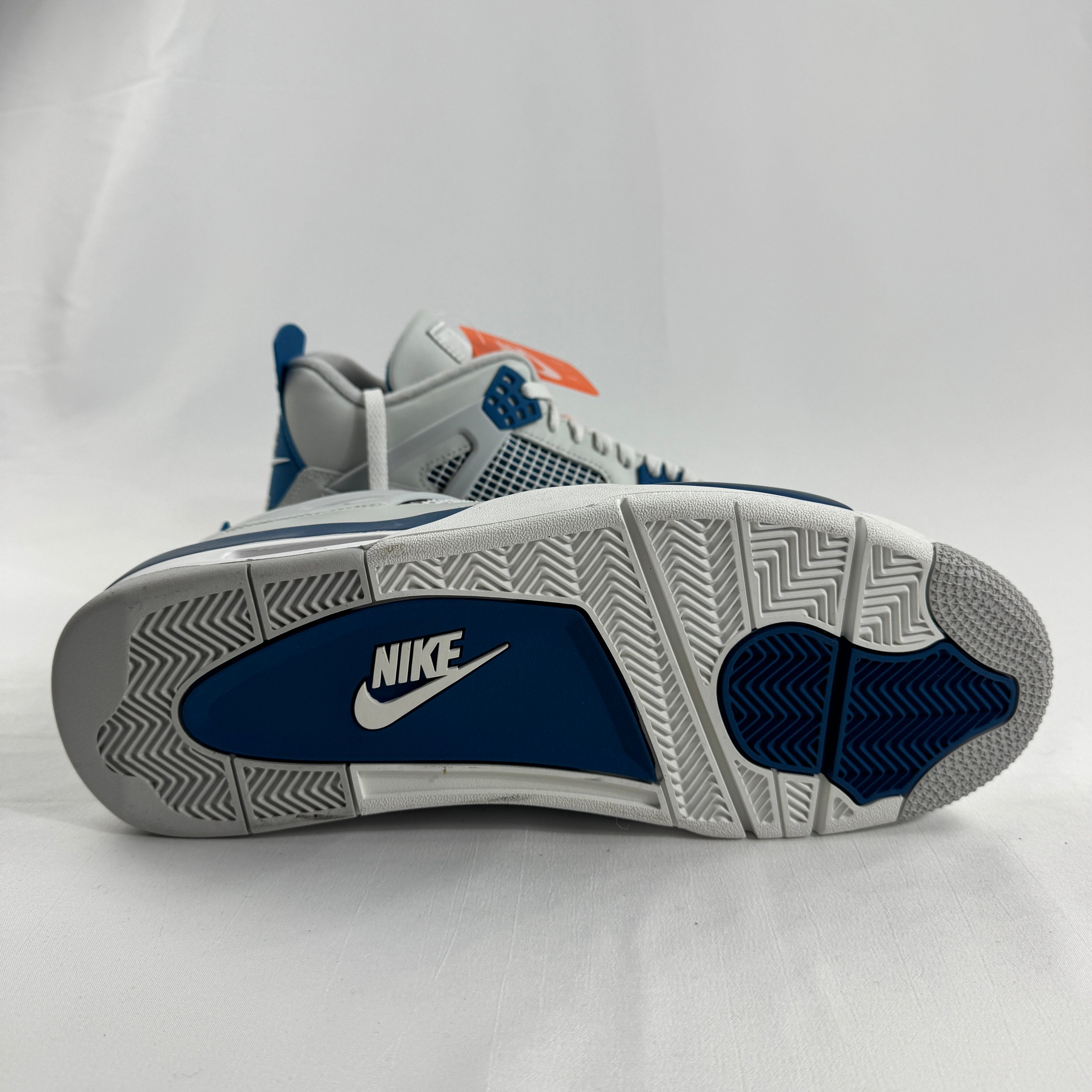 The Air Jordan 4 Retro “Military Blue” is a classic Jordan 4 colourway featuring a white leather upper with grey and black