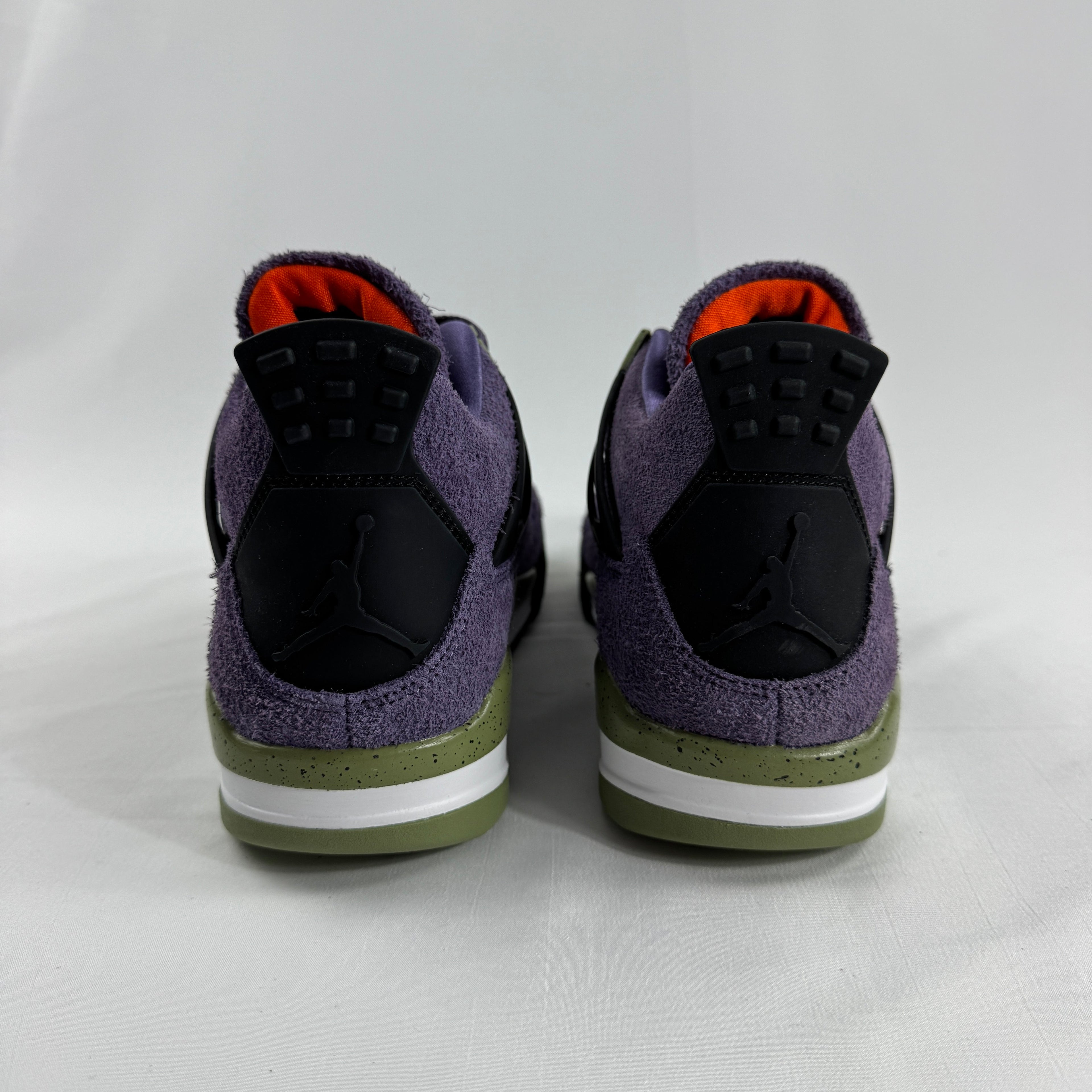 The Nike Air Jordan 4 Retro "Purple" showcases the iconic Air Jordan 4 silhouette with a bold purple color scheme that