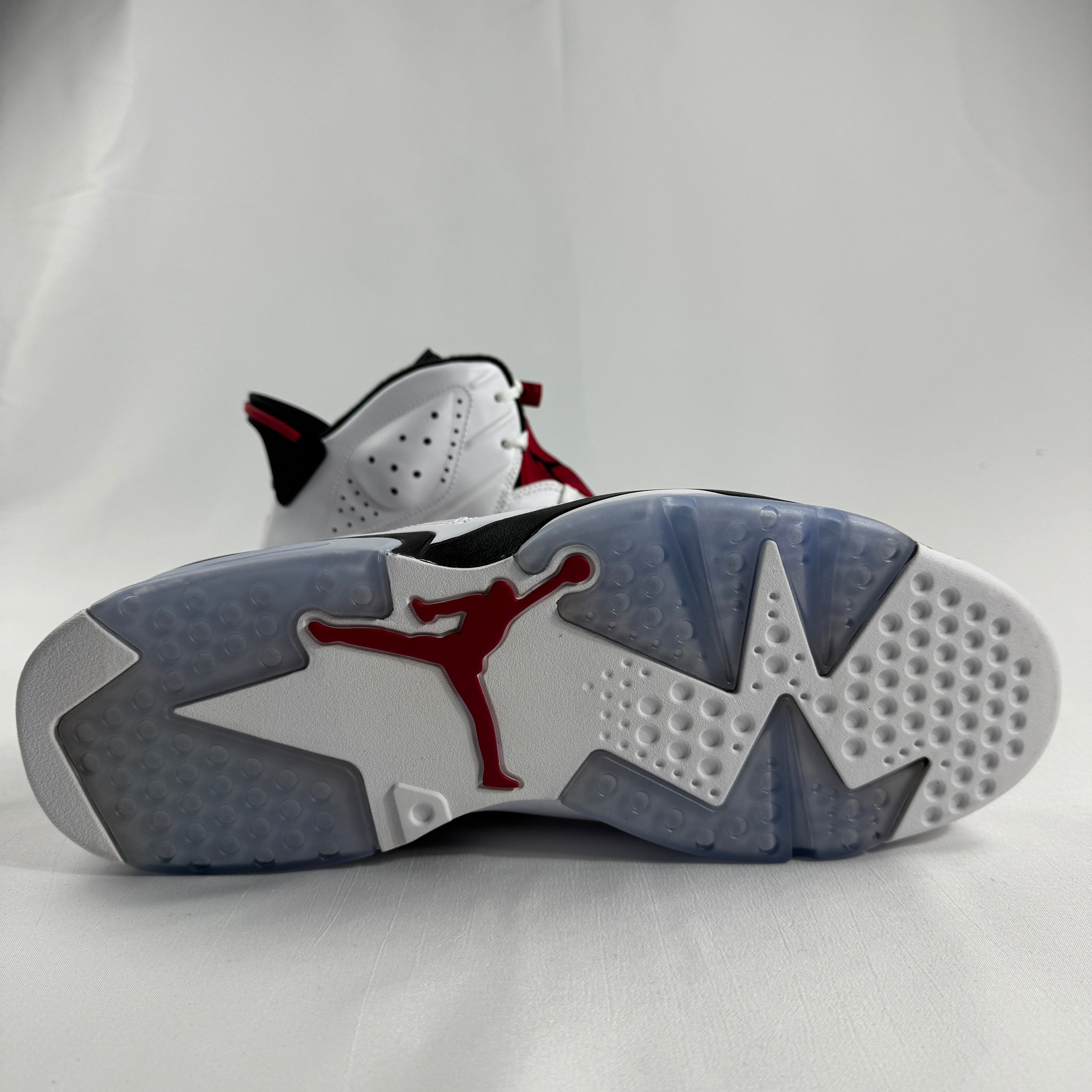 The Jordan 6 Retro Carmine is one of the most iconic colorways in the Air Jordan 6 lineup. Originally released in 1991 and