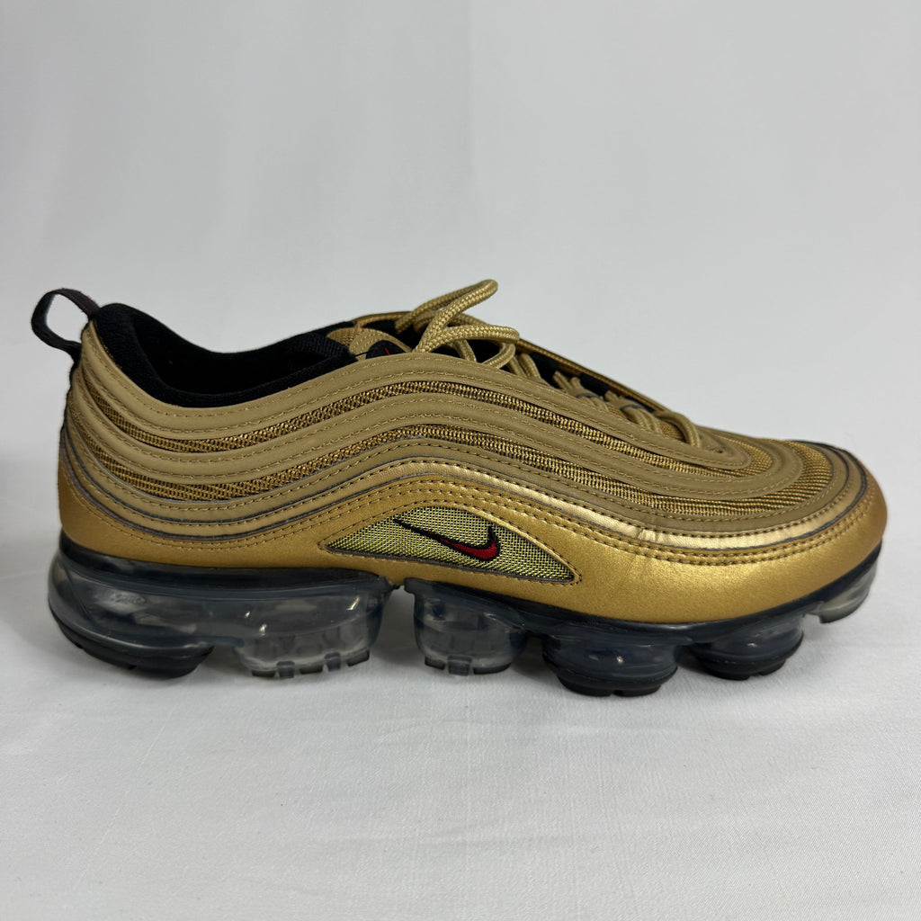 The Nike Air VaporMax 97 Metallic Gold combines the iconic Air Max 97 design with full-length VaporMax cushioning, featuring