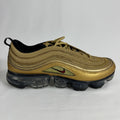 The Nike Air VaporMax 97 Metallic Gold combines the iconic Air Max 97 design with full-length VaporMax cushioning, featuring
