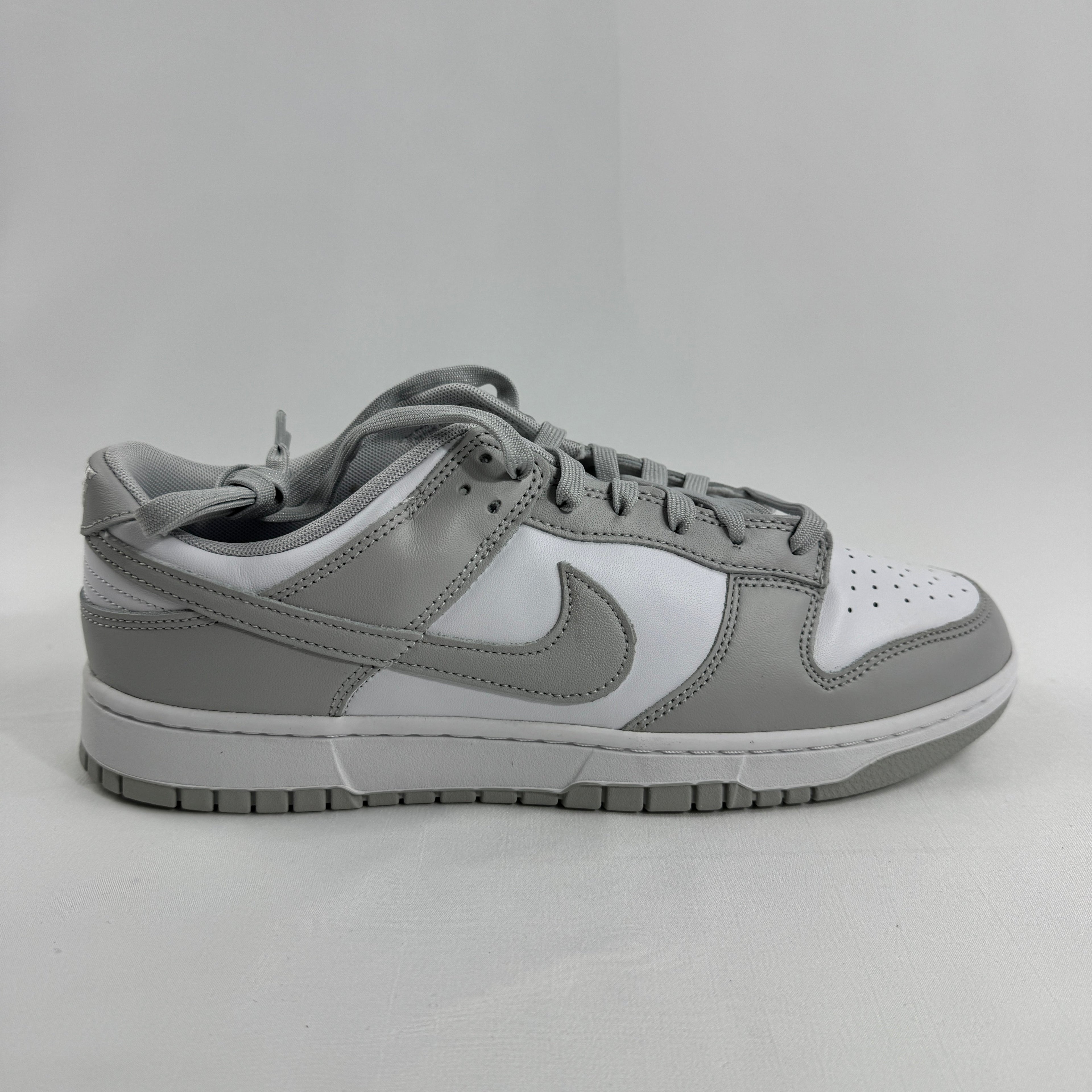 Nike Dunk Low Retro is a timeless sneaker that brings back the classic basketball silhouette from the 1980s. Featuring a