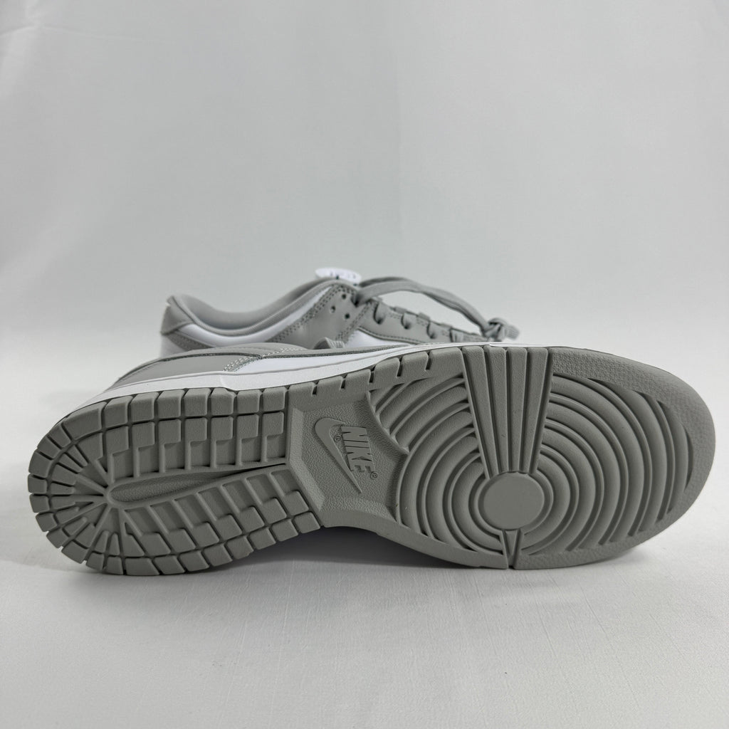 Nike Dunk Low Retro is a timeless sneaker that brings back the classic basketball silhouette from the 1980s. Featuring a