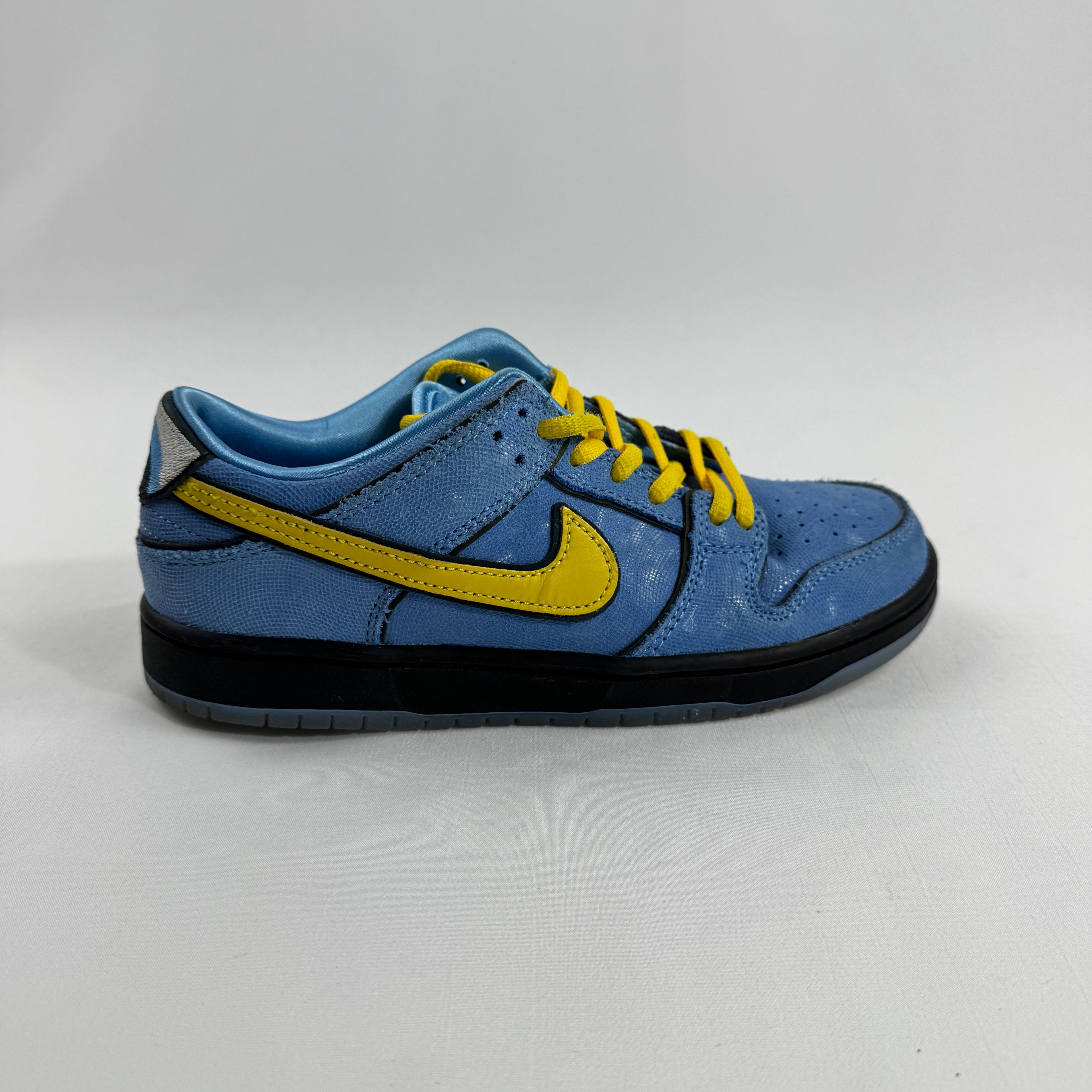 Nike SB Dunk Low Pro QS PS is a limited-edition skateboarding sneaker that combines the classic Dunk Low silhouette with