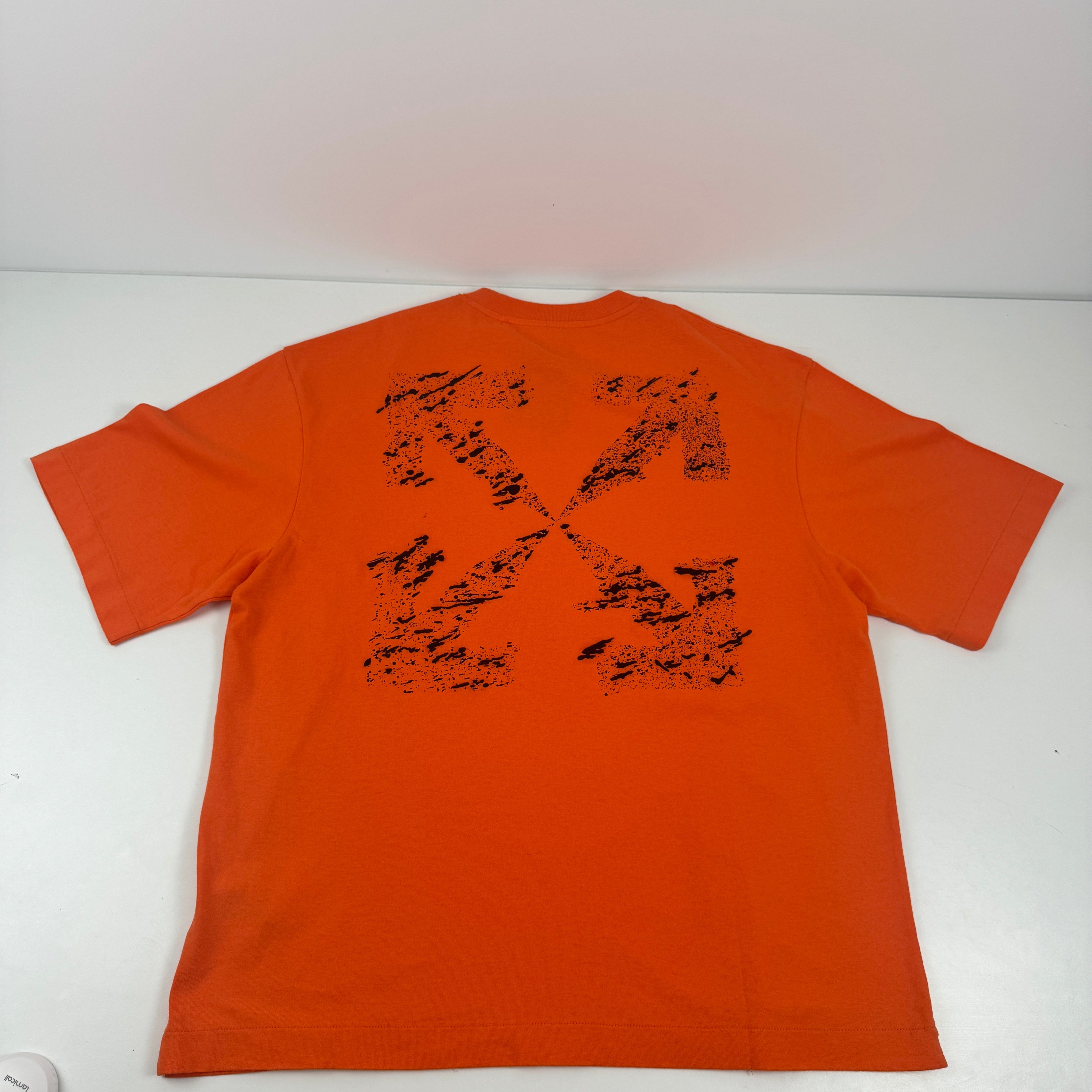 Bright orange oversized tee featuring a subtle Off White logo print on the chest and arrow detailing on the back. Made from