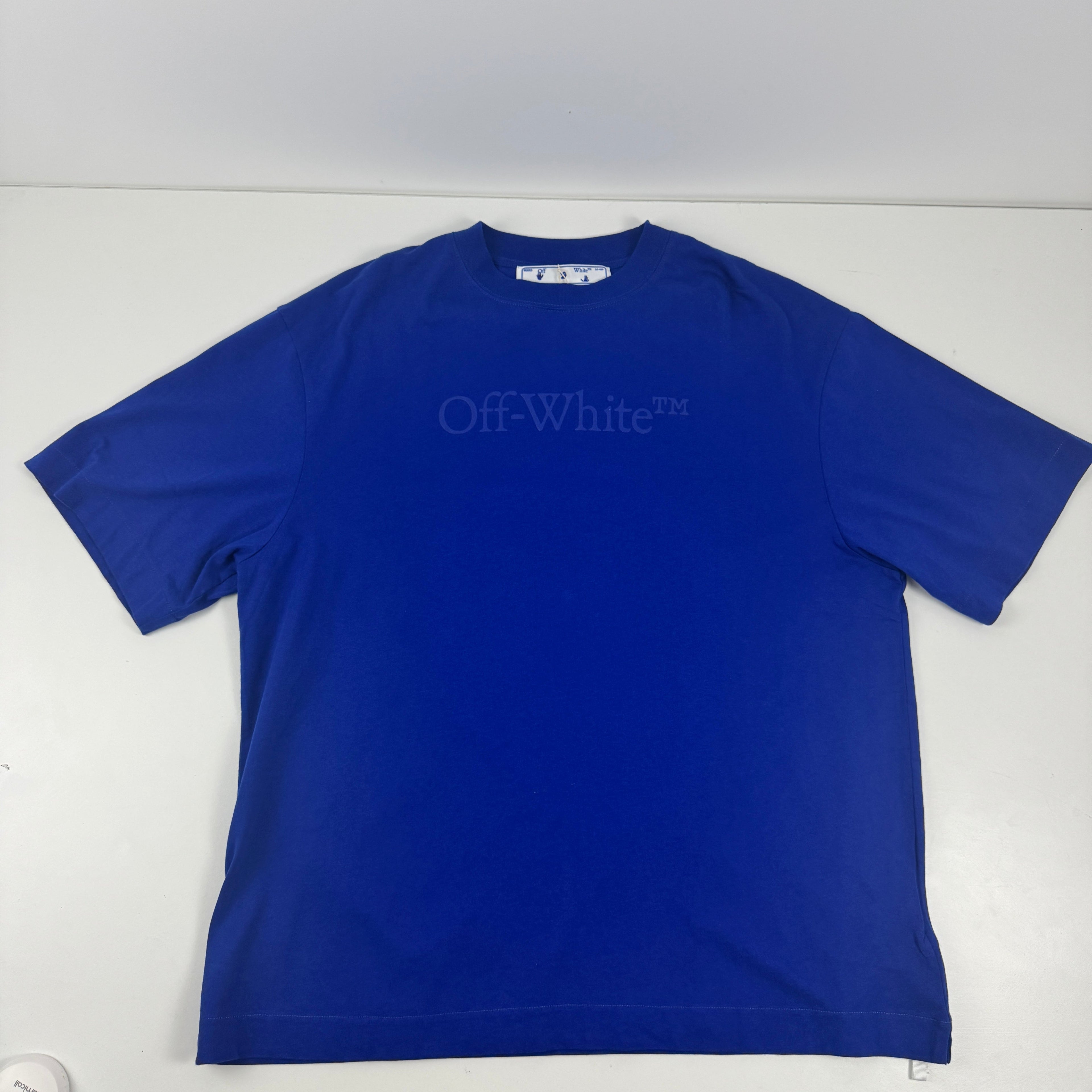 This Off-White tee features a subtle embroidered style tonal logo on a striking blue colour. Perfect for layering and