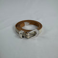 The Our Legacy White Belt Cracked is a premium leather belt crafted from cracked-finish leather for a distinctive worn-in