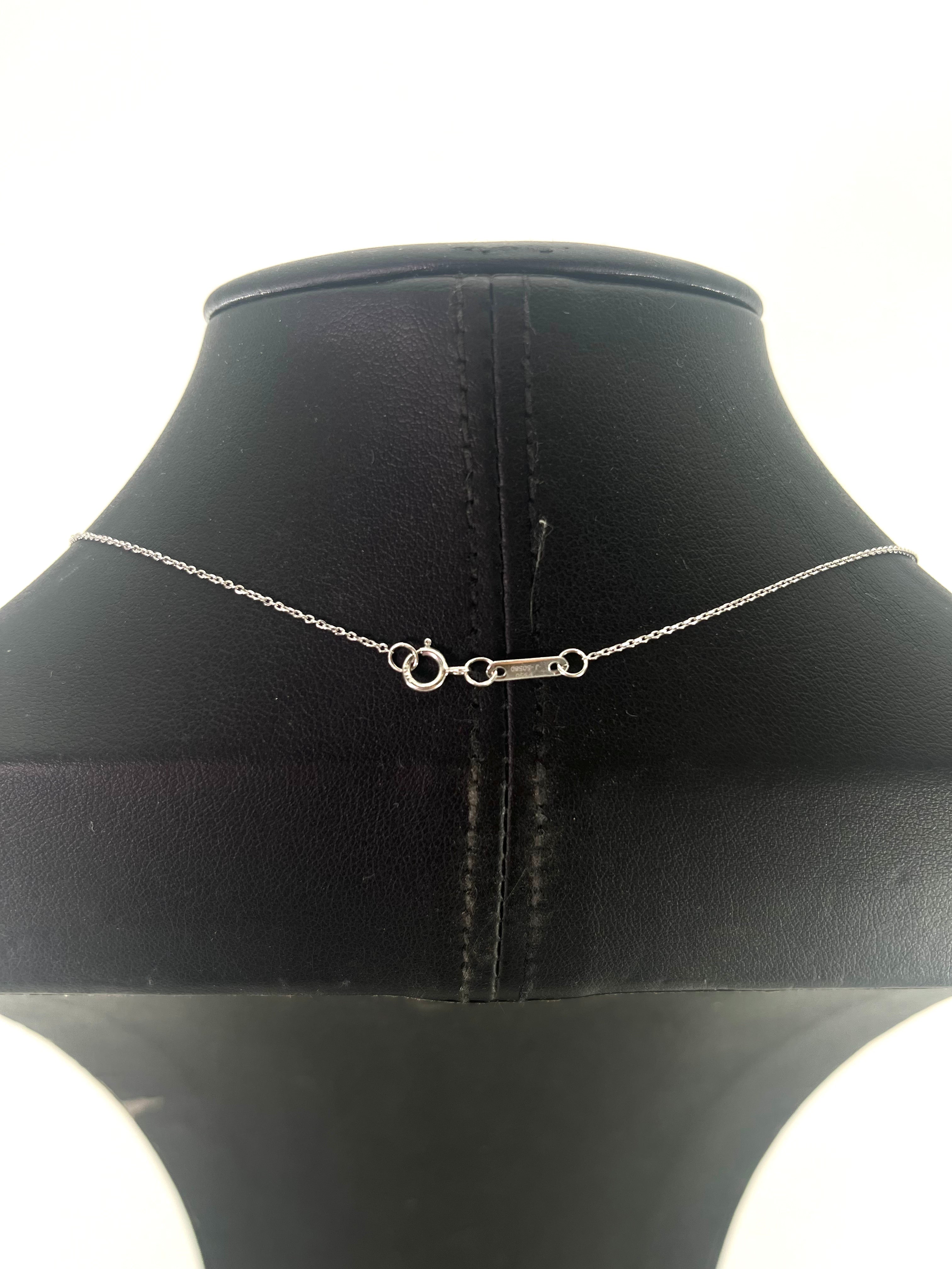 CB STORES pear-shaped diamond platinum necklace shown on a black bust from the back, featuring a spring ring and bar clasp.