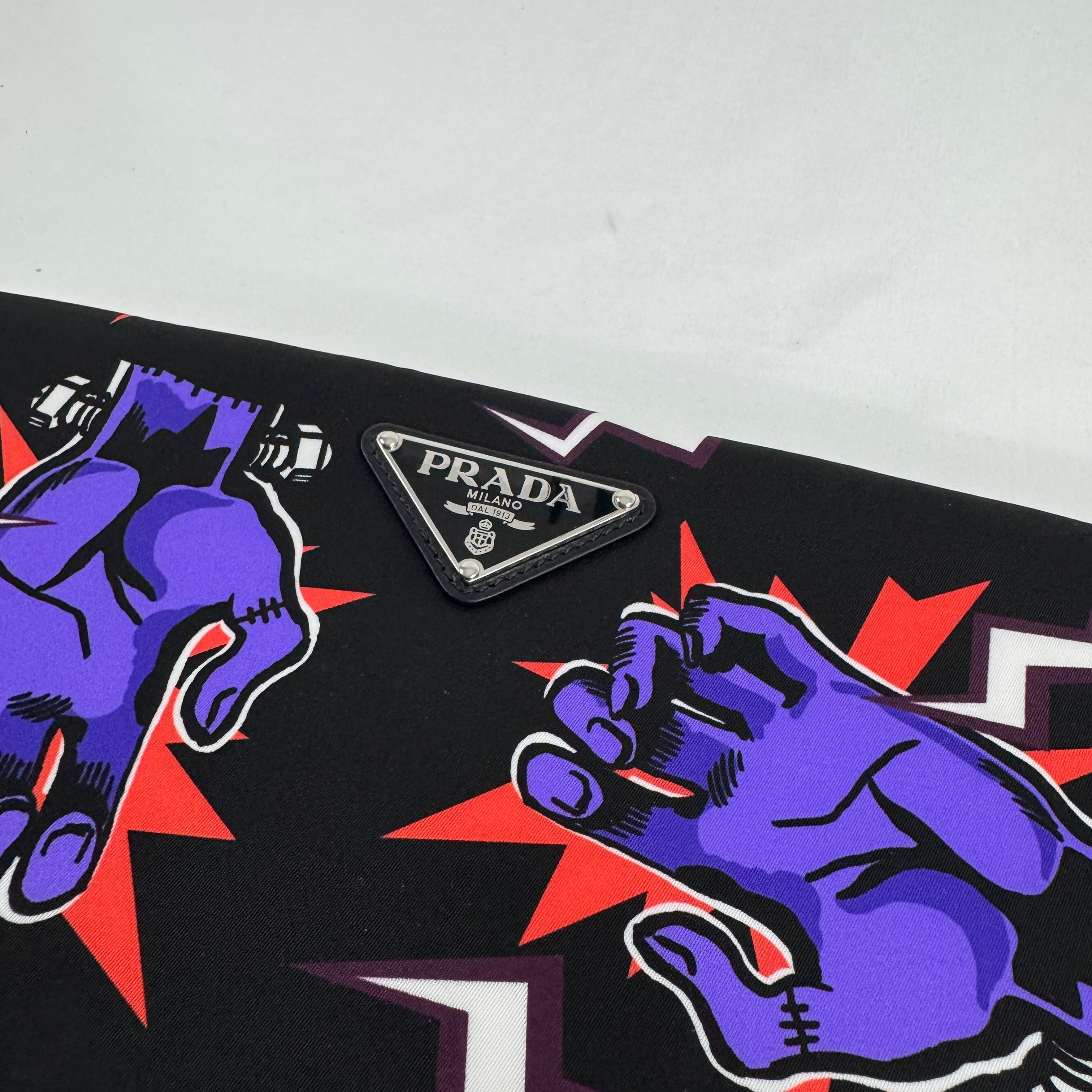 The Prada x Frankenstein Clutch Bag is a conceptual luxury-style accessory inspired by Frankenstein themes, combining