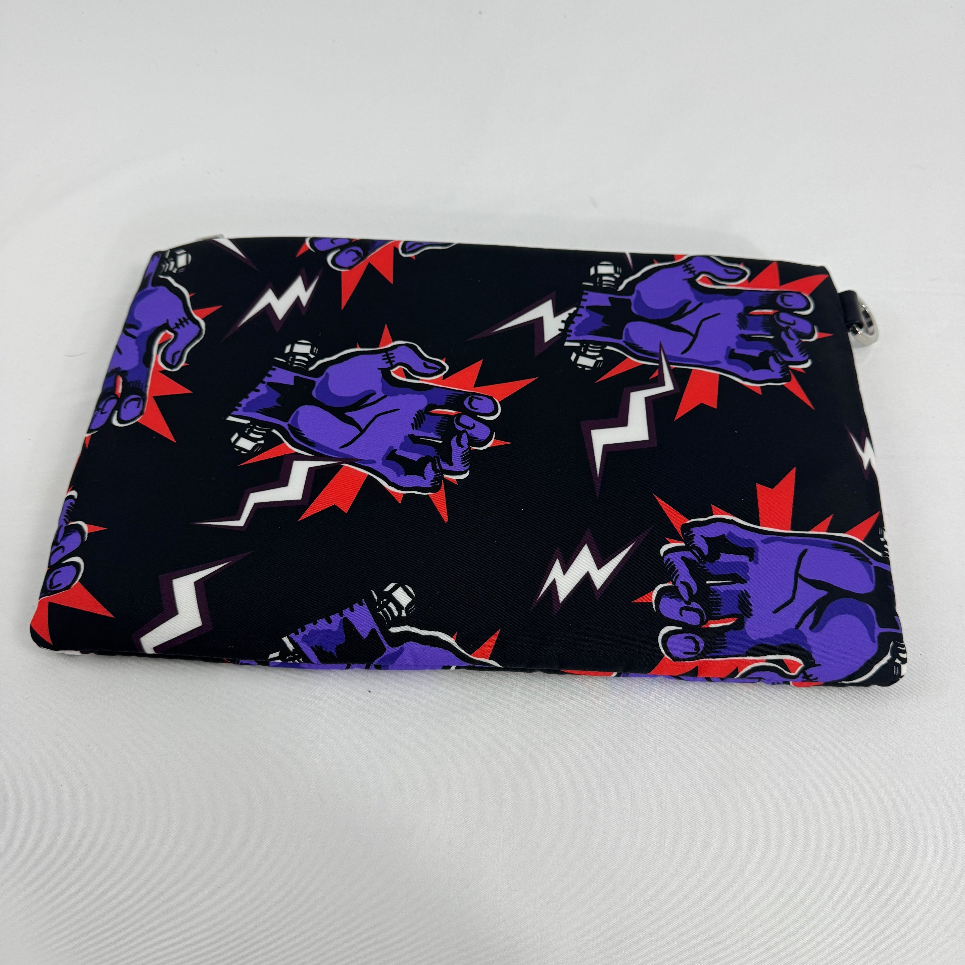 The Prada x Frankenstein Clutch Bag is a conceptual luxury-style accessory inspired by Frankenstein themes, combining