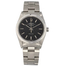Rolex wristwatch with a stainless steel case, black dial, silver hour markers and a metal bracelet shown on a white background.