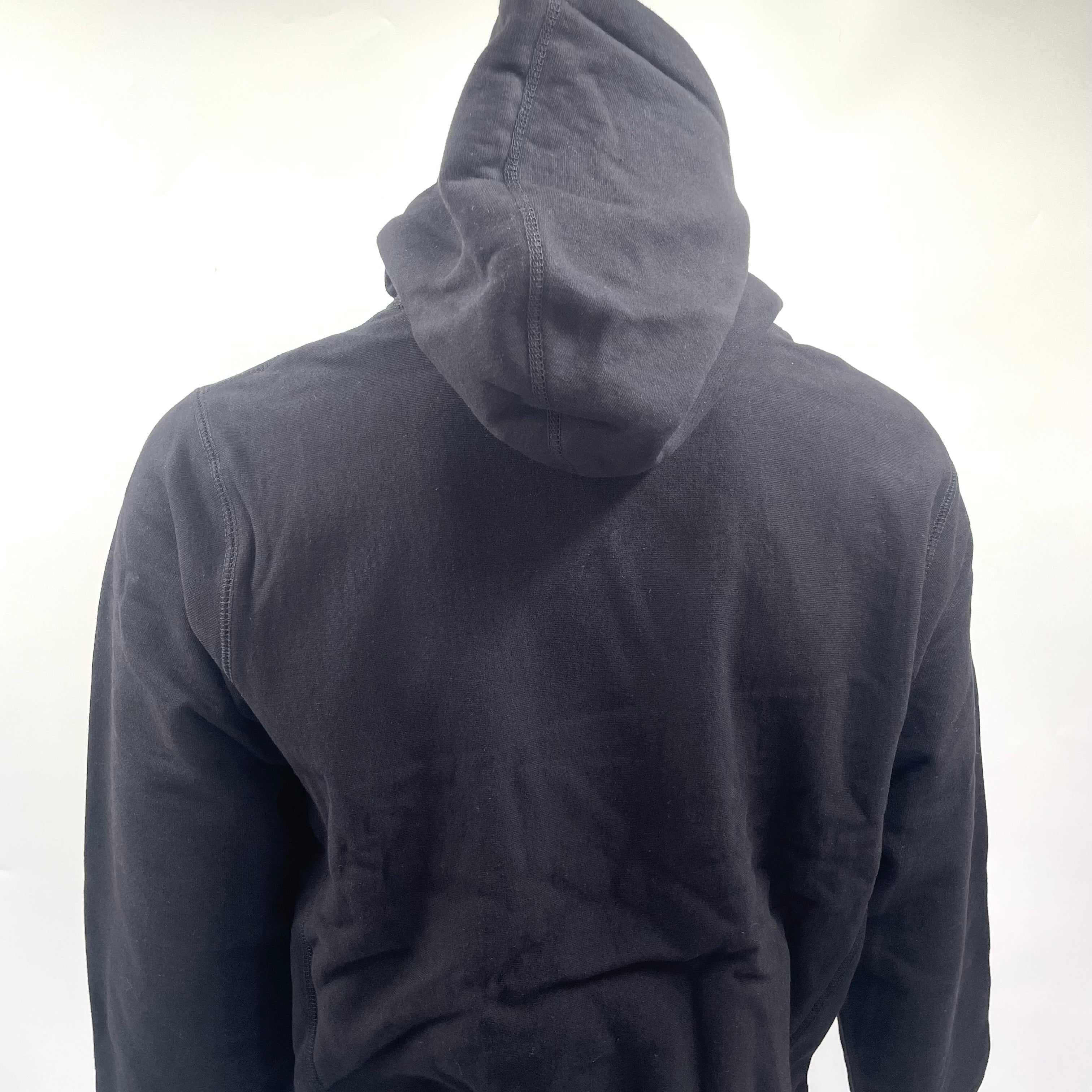Supreme Box Logo Hoodie in black. Size Medium, patterned logo.