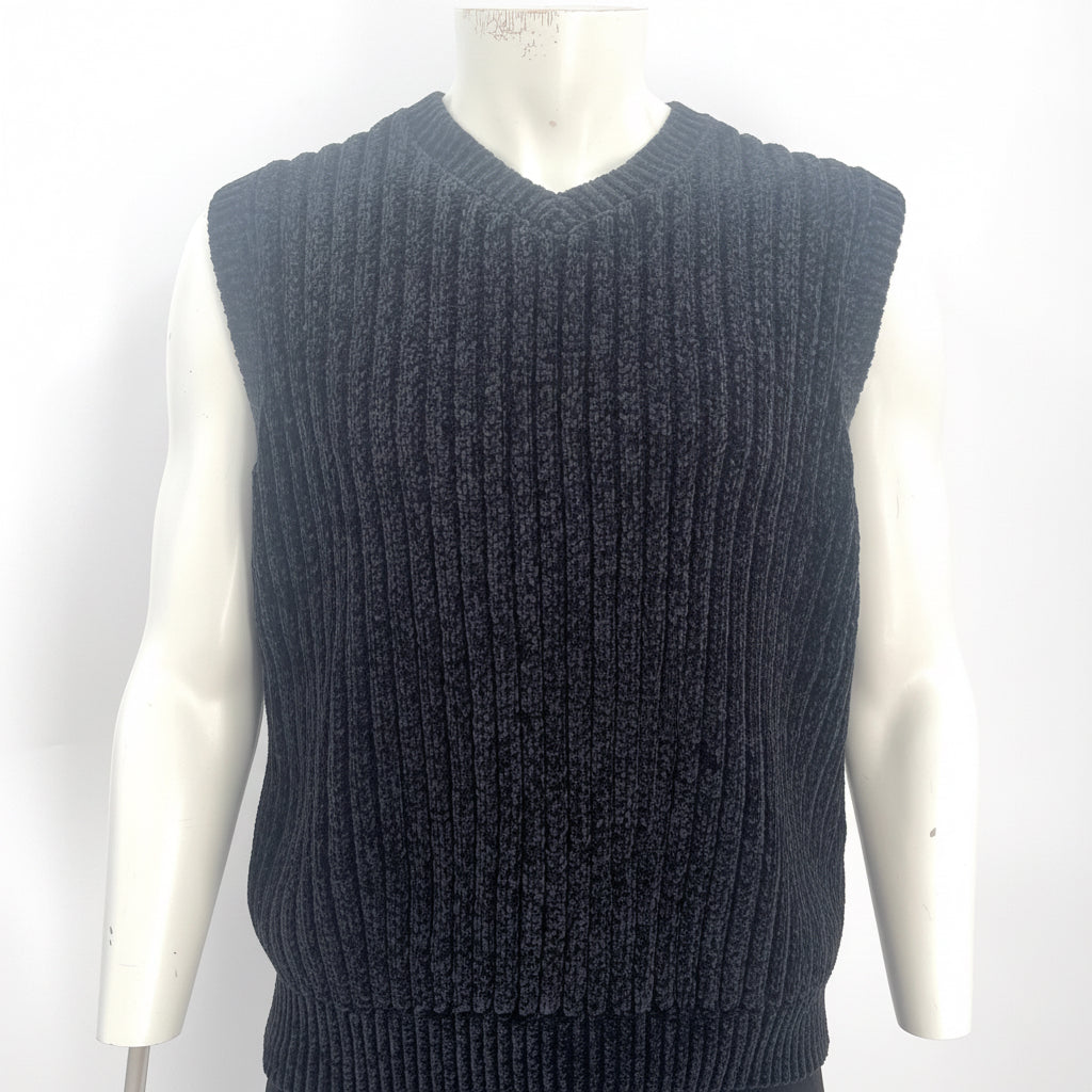 The Supreme Exquisite Chenille Knit Sweater Vest Black is a premium knit vest made from soft chenille fabric for a textured,