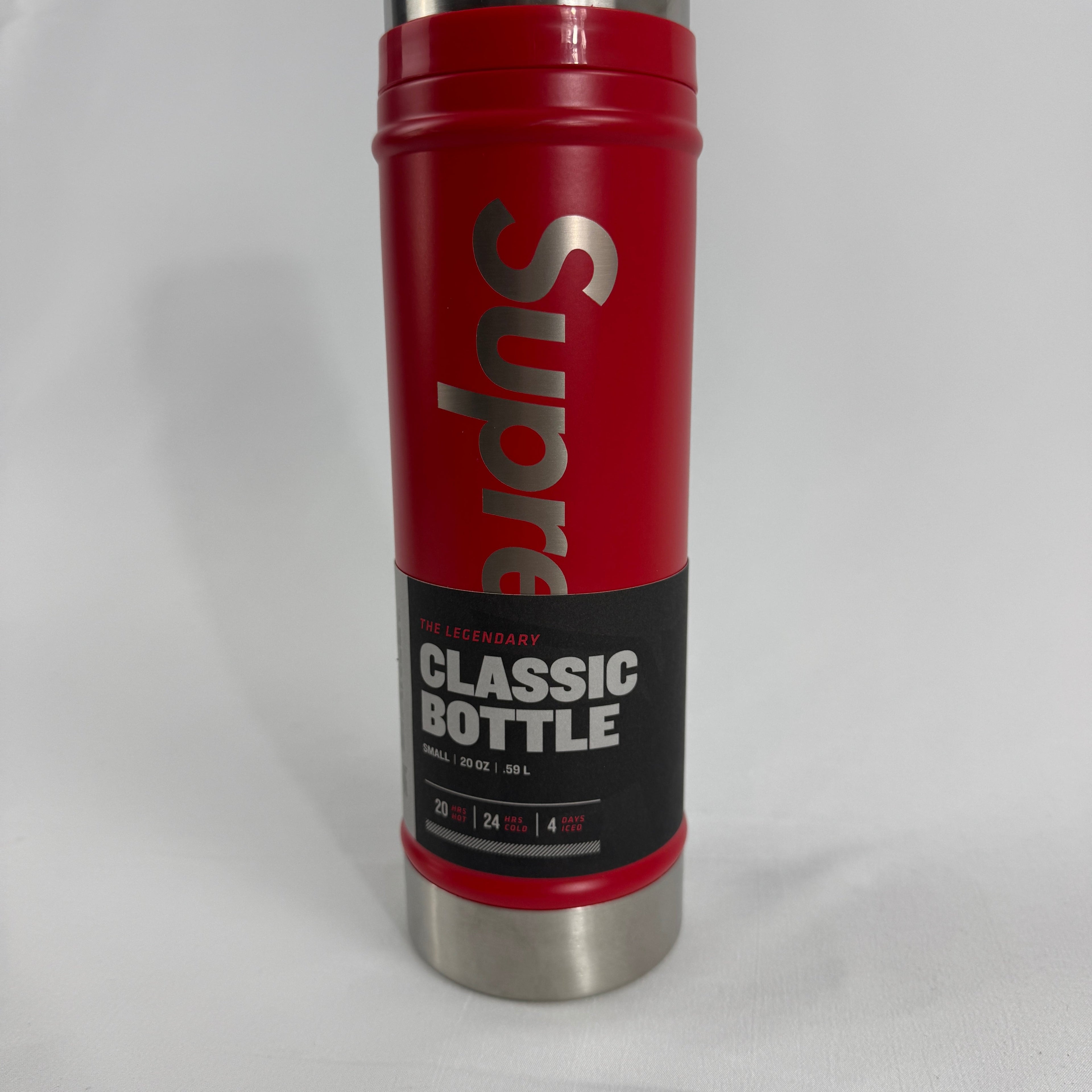 Supreme Classic Water Bottle in red, featuring bold Supreme branding on a compact 0.59L ( 20oz) bottle. A practical everyday