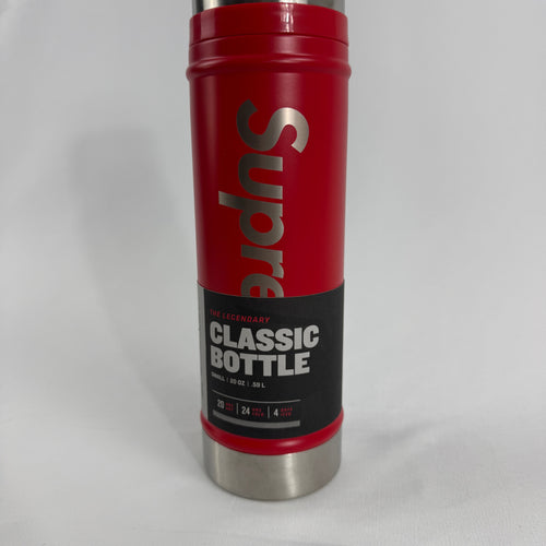Supreme Classic Water Bottle in red, featuring bold Supreme branding on a compact 0.59L ( 20oz) bottle. A practical everyday