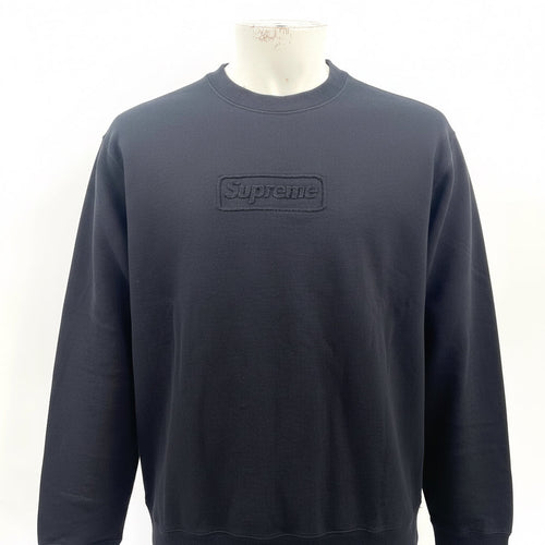 Supreme Cutout Logo Crewneck Sweatshirt in black, featuring a subtle tonal Supreme logo detail on the chest. A clean and