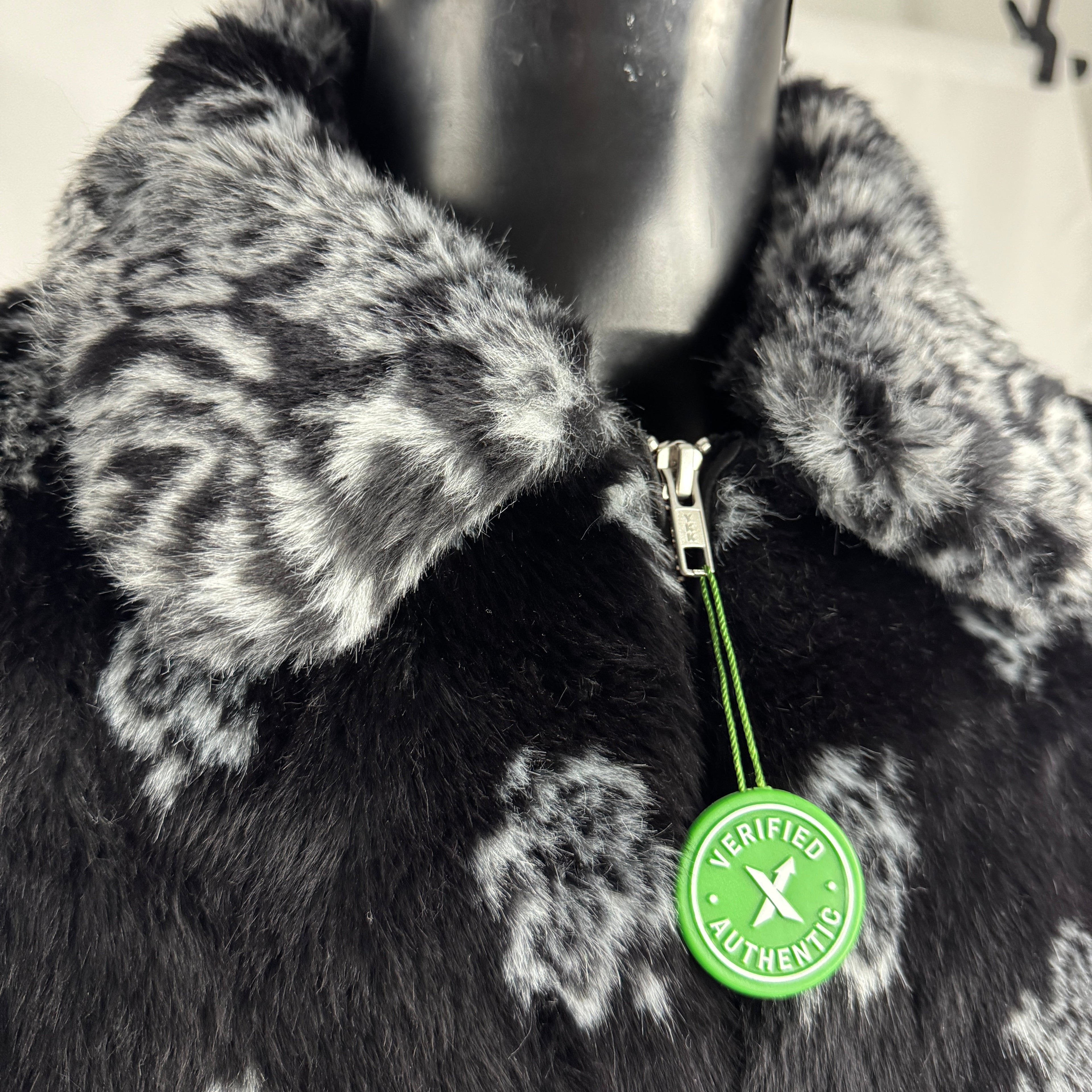 The Supreme Faux Fur Zip-Up Jacket is a heavyweight streetwear piece made with a faux fur outer shell and a full zip front.