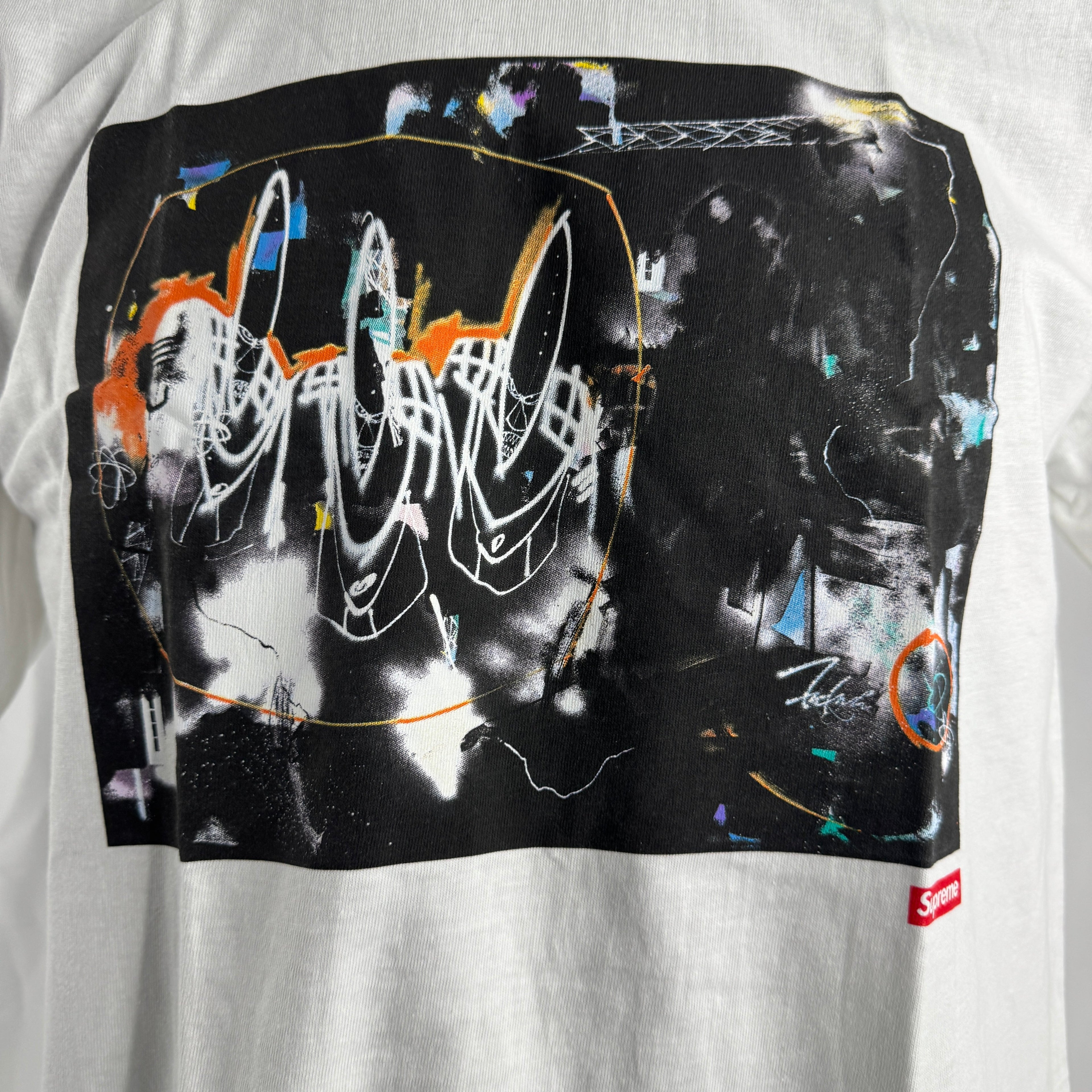 The Supreme Futura Shirt is a graphic T-shirt featuring artwork by Futura 2000, known for his abstract graffiti-inspired