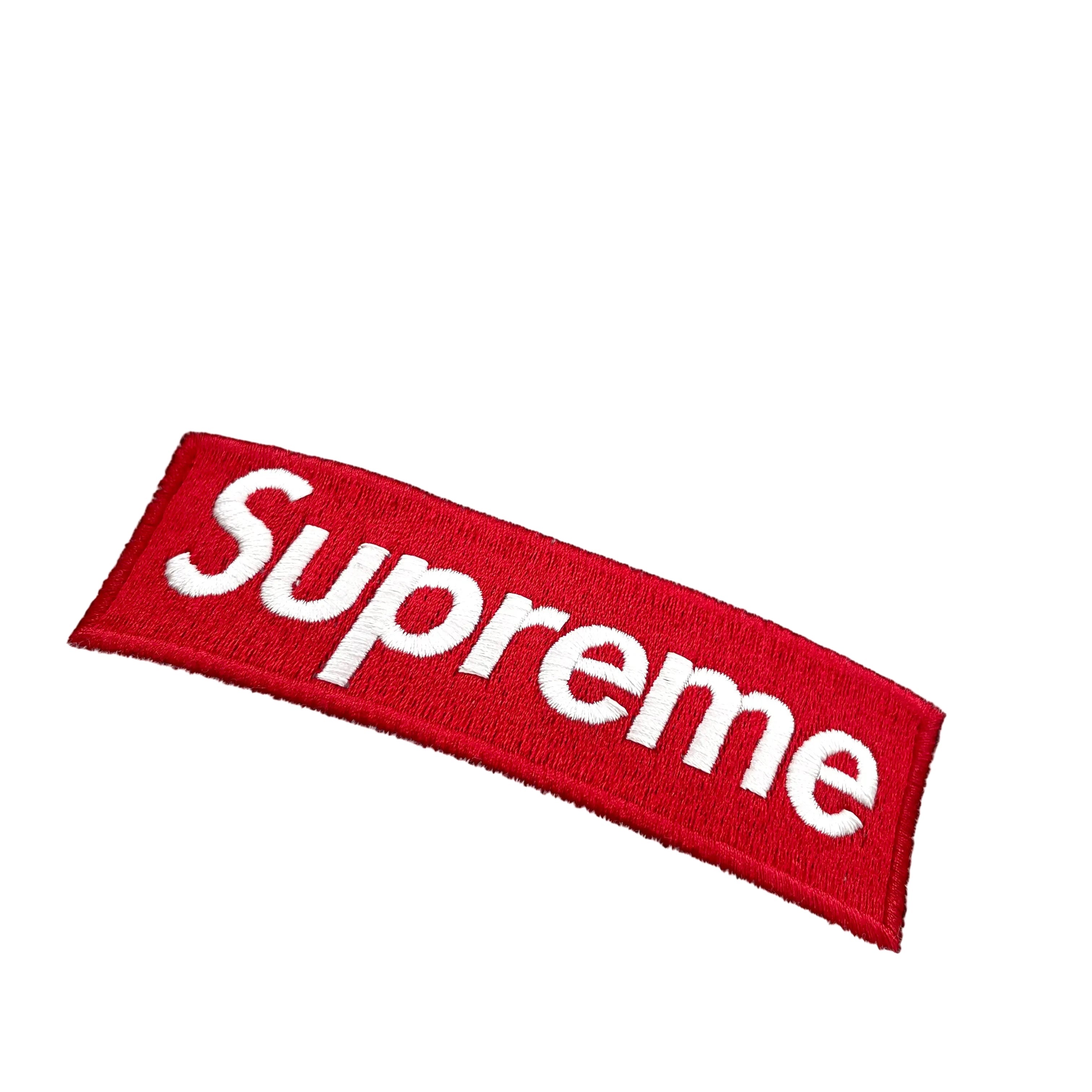Classic New Era Collab Beanie Supreme, red box logo, plain grey.