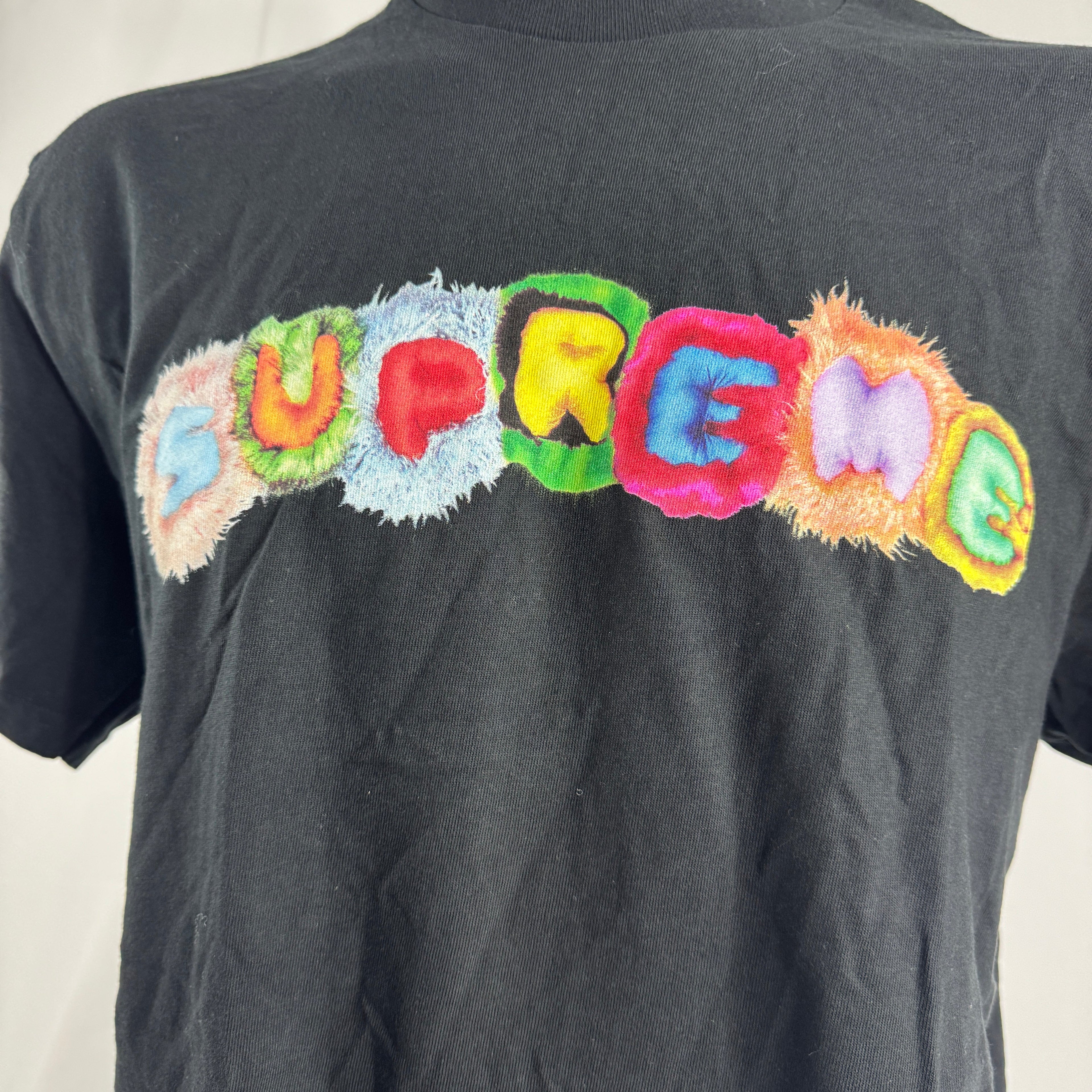The Supreme Pillows Tee is a classic cotton T-shirt featuring a graphic inspired by the American rock band The Pillows. It