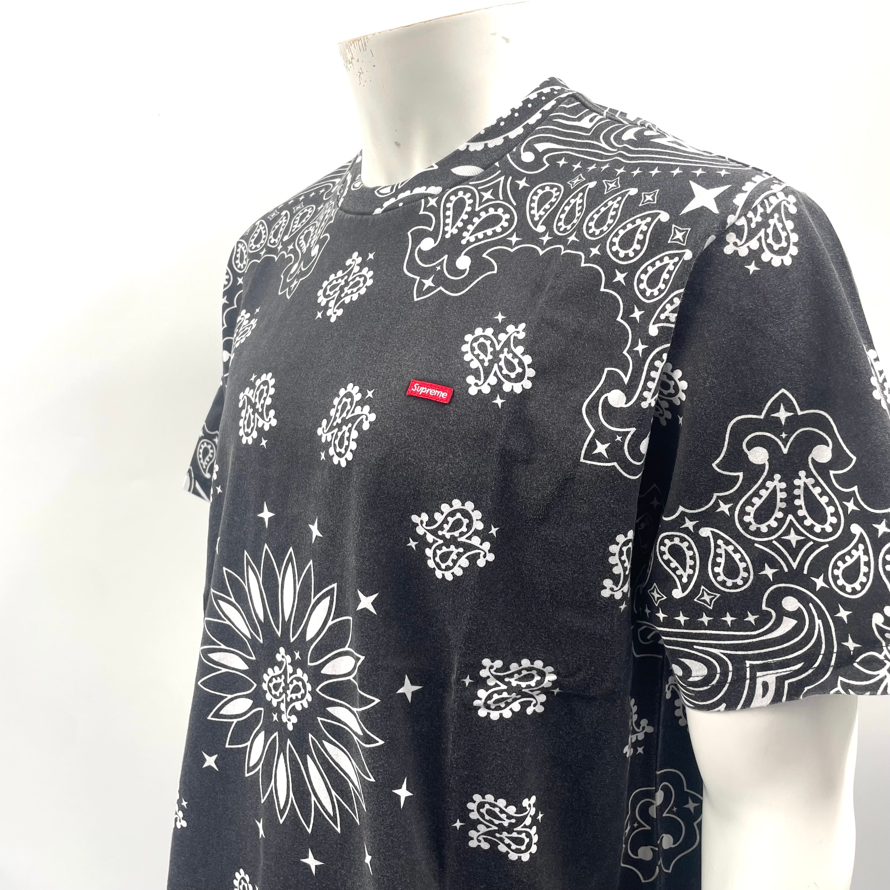 Supreme Small Box TEE in black, featuring an all-over floral and bandana-style pattern with a subtle red Supreme small box