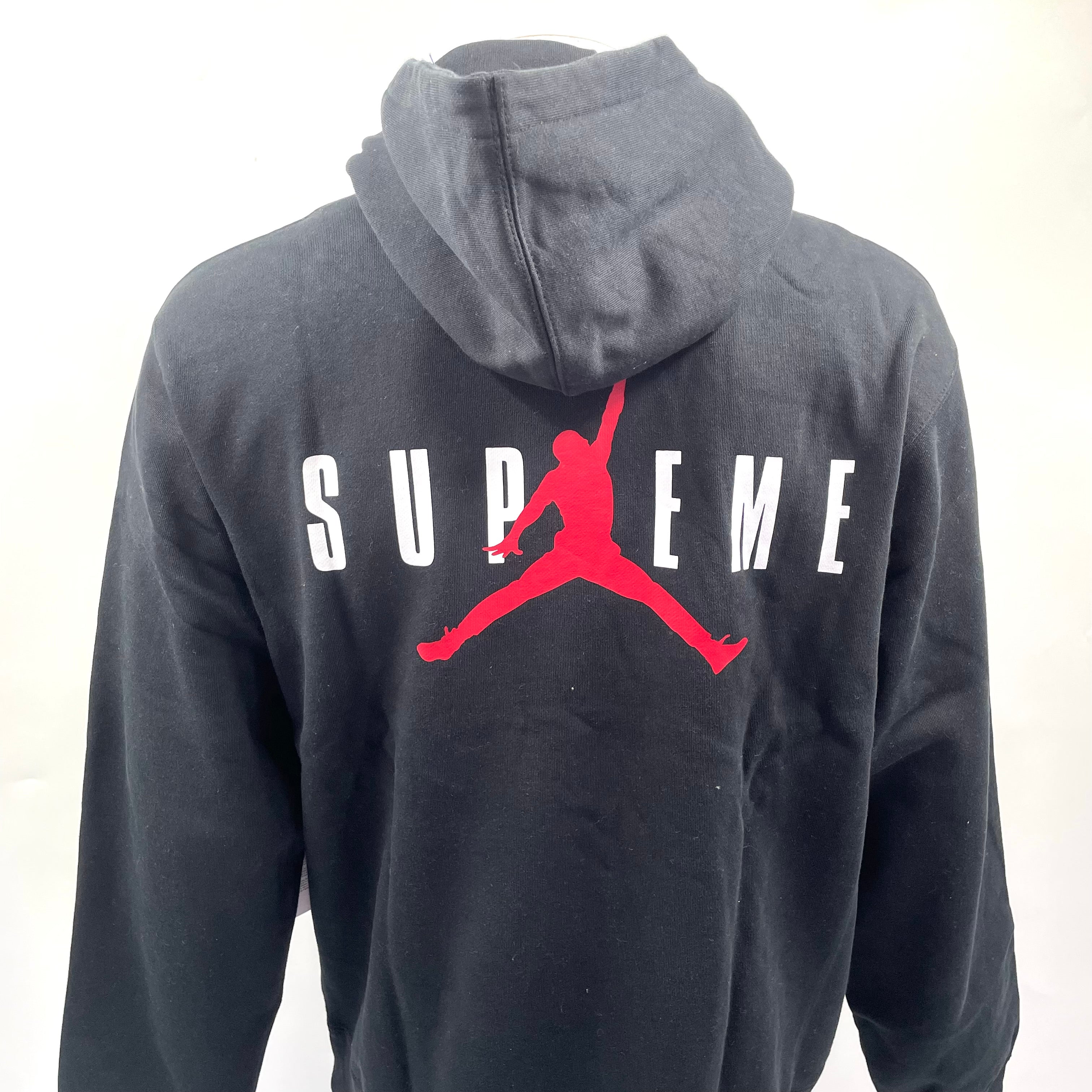 A standout Supreme x Jordan black hoodie with embroidered front branding, bold rear Jumpman logo, drawstring hood and