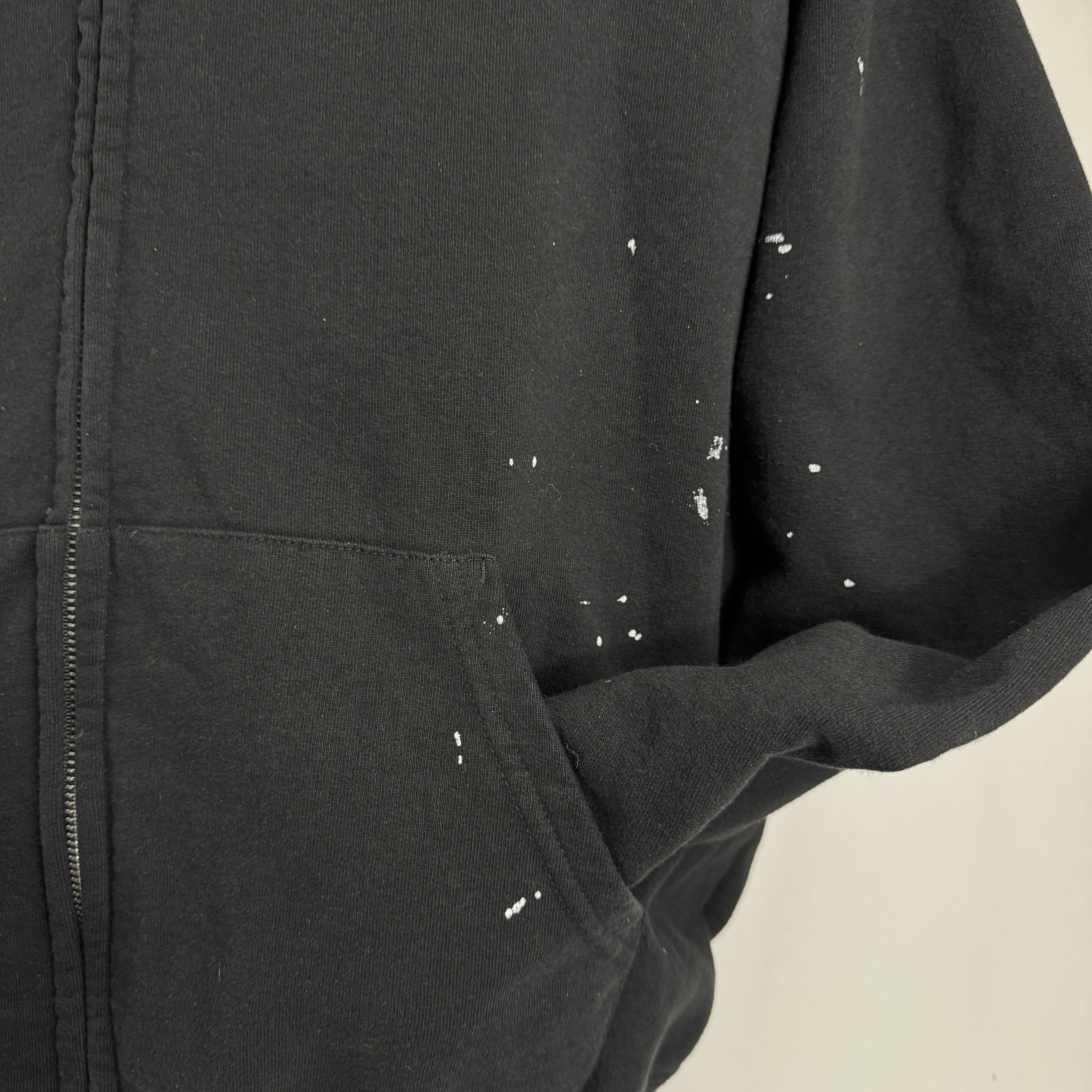 The Supreme x Maison Margiela Box Logo Zip Up is a limited-edition collaboration hoodie featuring Supreme’s iconic Box Logo,