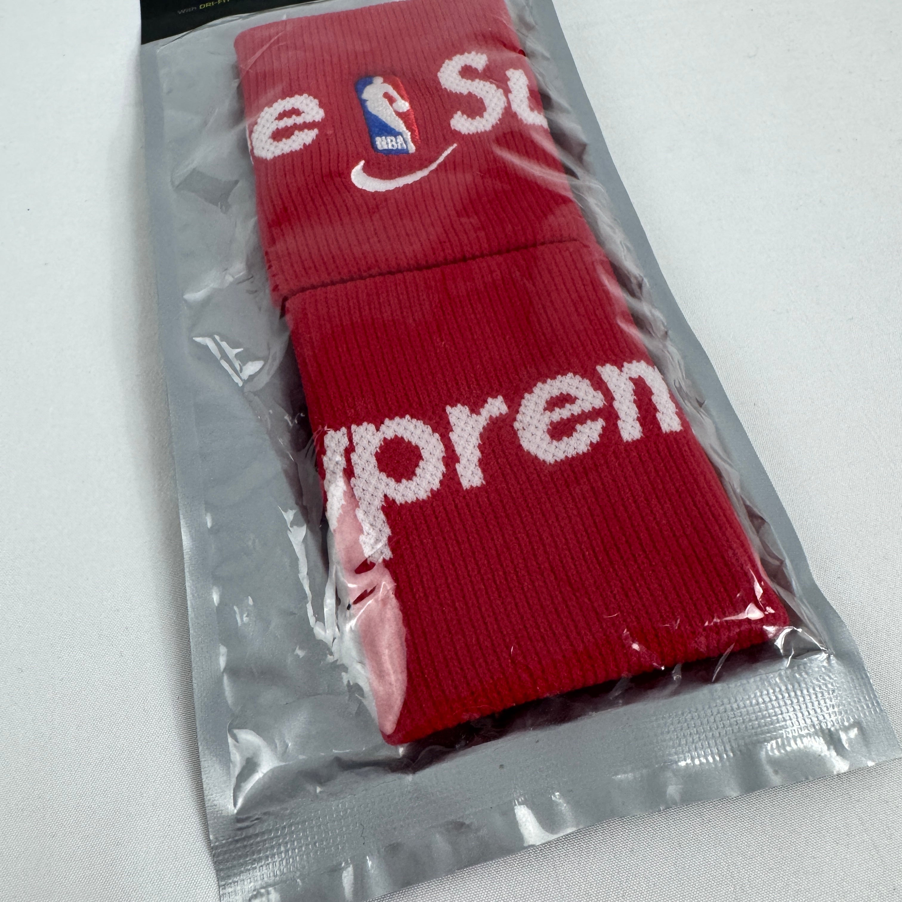 The Supreme x Nike Wristbands are a collaborative accessory set made from soft, absorbent terry cloth designed for athletic