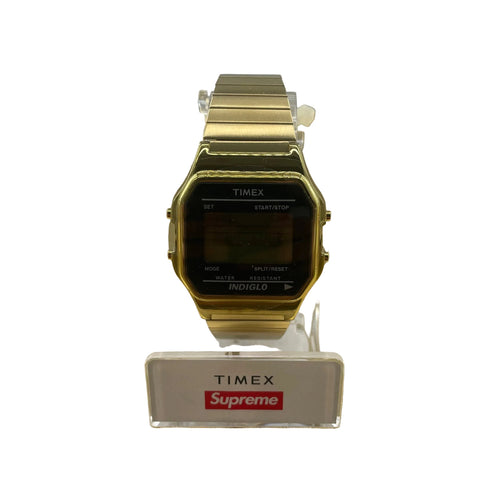 Gold coloured TIMEX X SUPREME wristwatch, brand new.