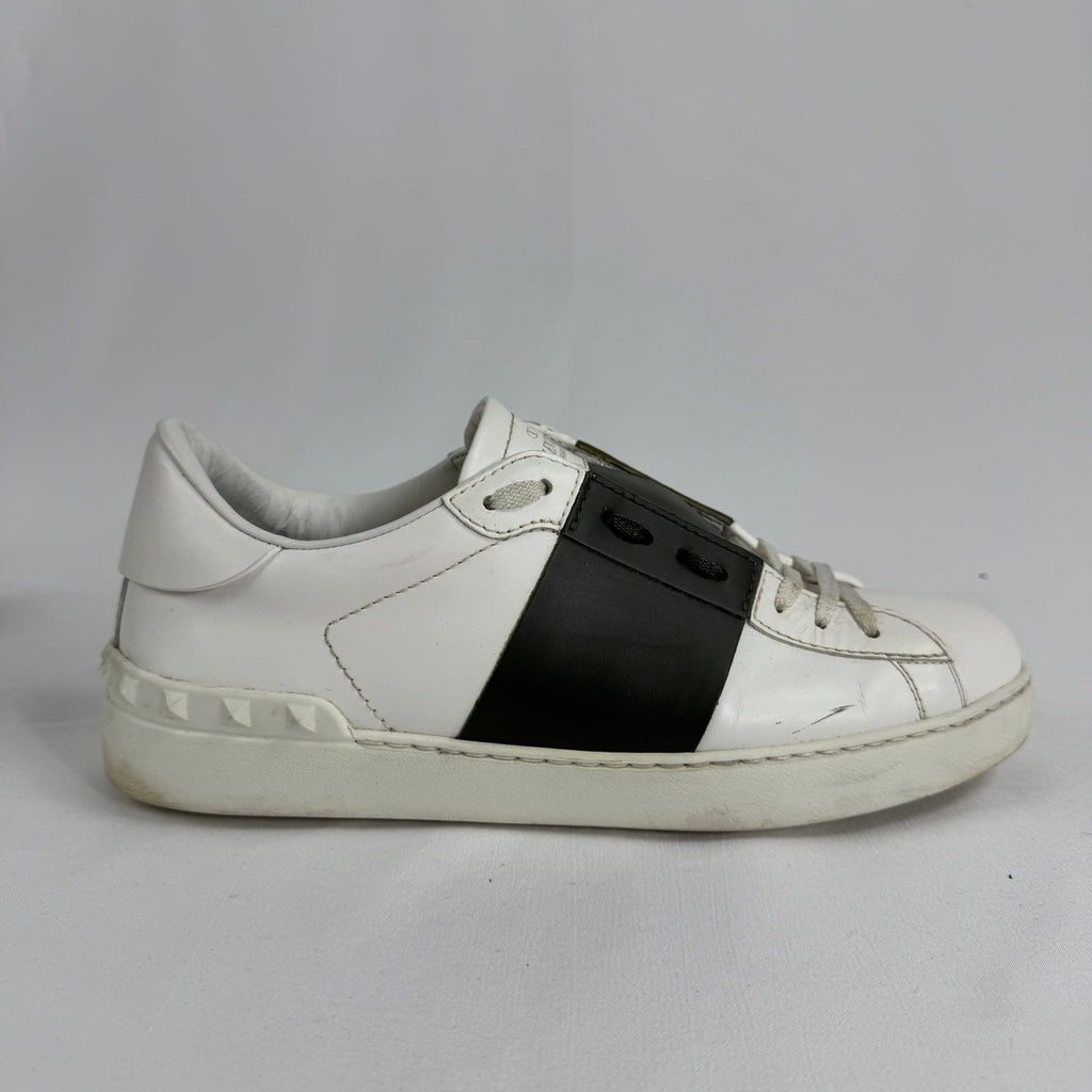 The Valentino Garavani Open Trainers are a refined luxury sneaker known for their clean, minimalist design and premium