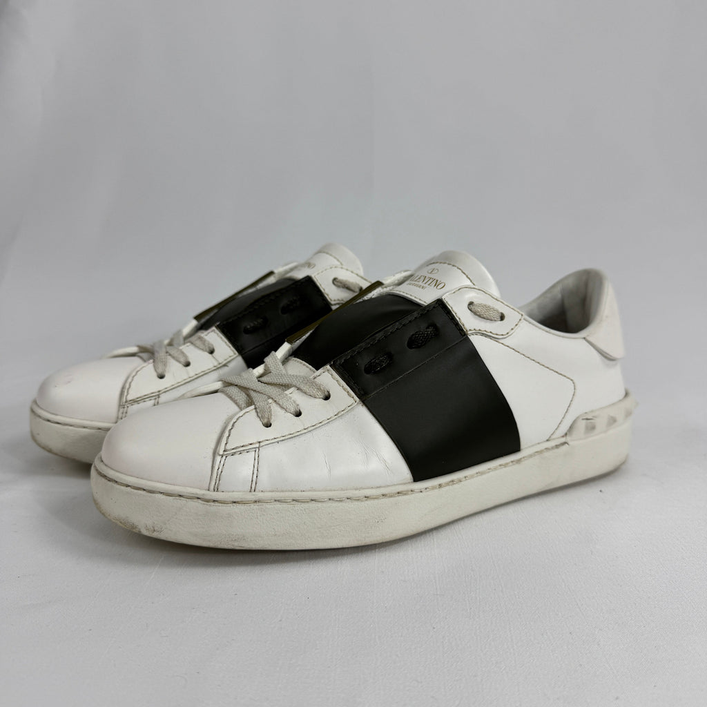 The Valentino Garavani Open Trainers are a refined luxury sneaker known for their clean, minimalist design and premium
