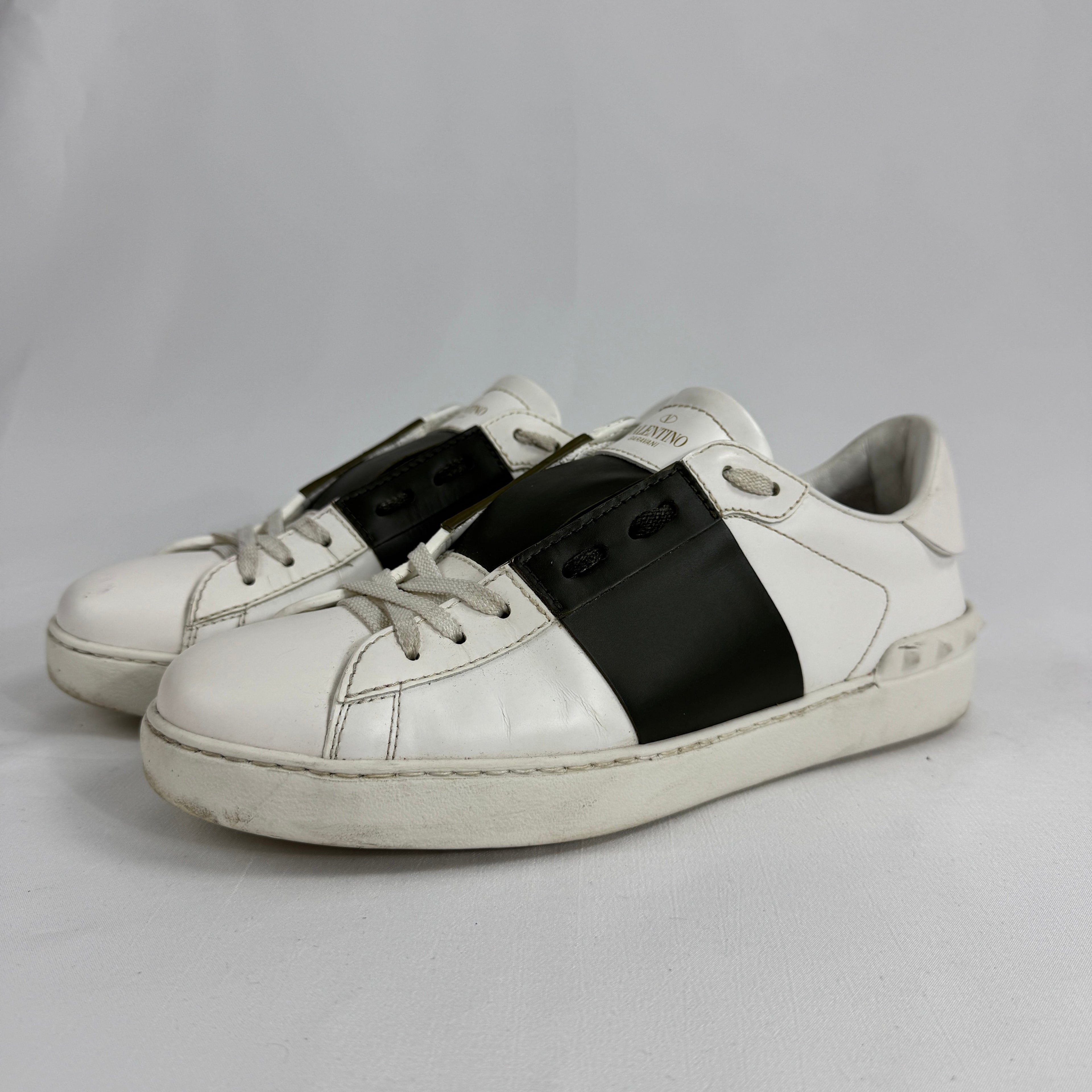 The Valentino Garavani Open Trainers are a refined luxury sneaker known for their clean, minimalist design and premium