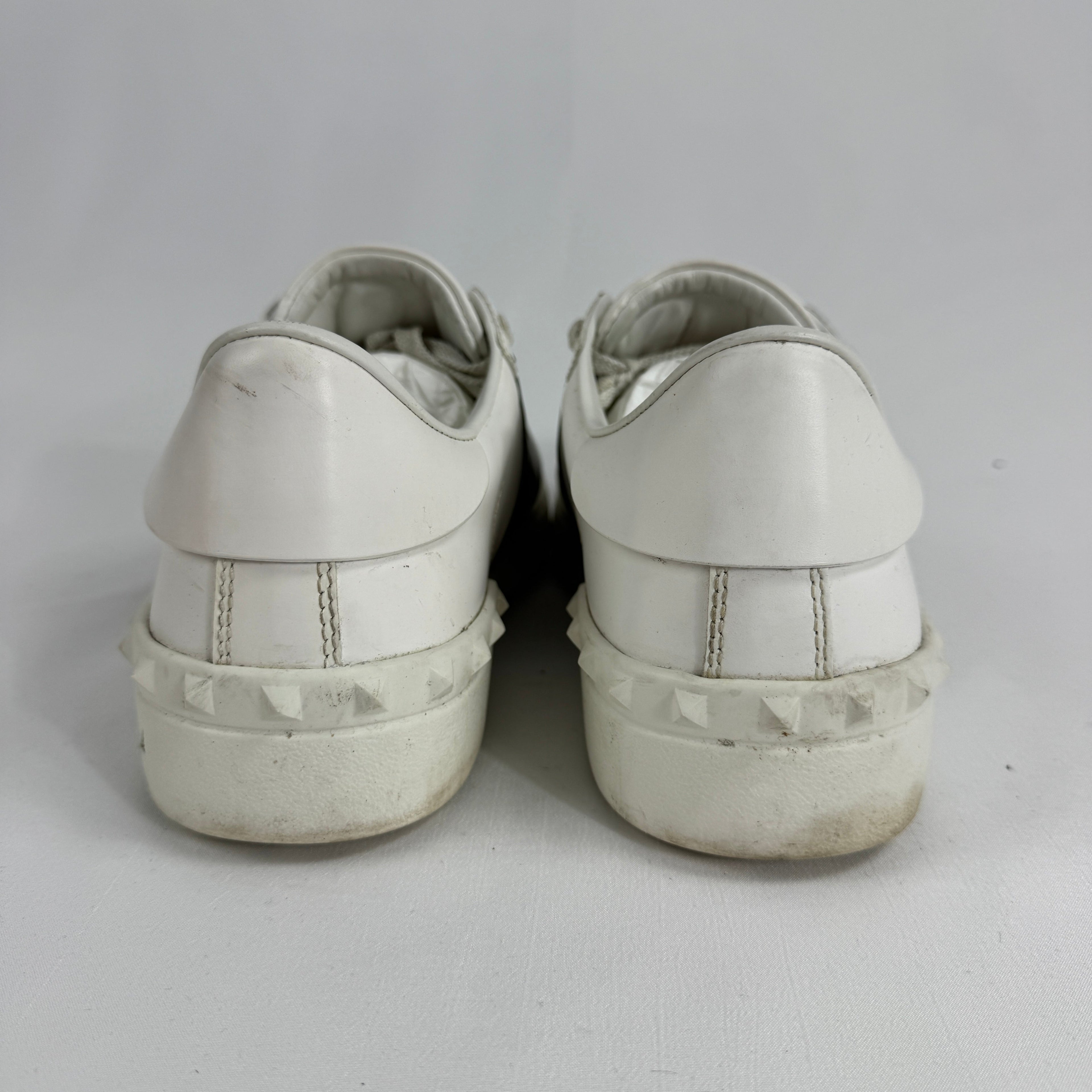 The Valentino Garavani Open Trainers are a refined luxury sneaker known for their clean, minimalist design and premium